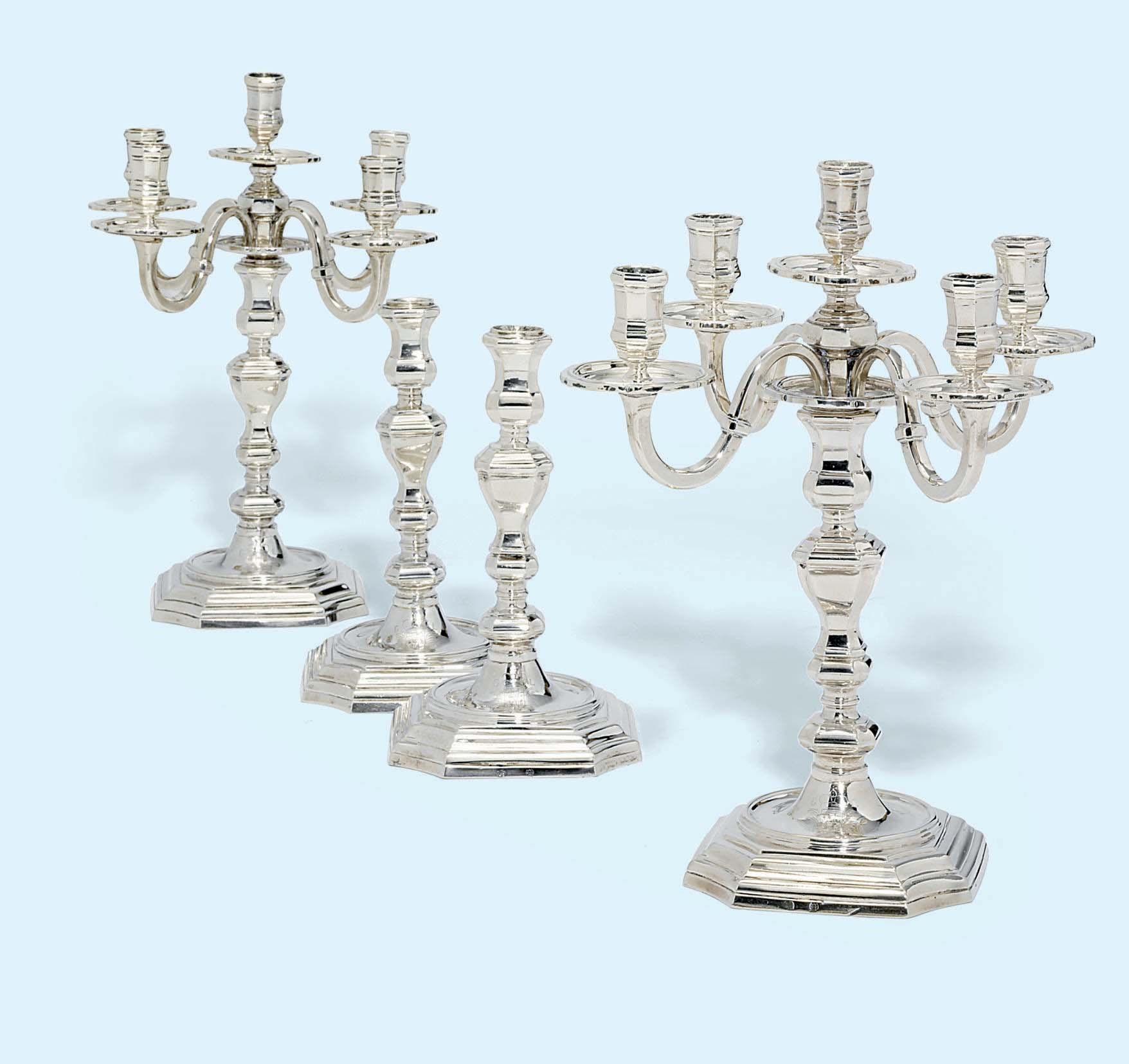 A SET OF FOUR CANDLESTICKS WITH TWO FIVE-LIGHT CANDLEARMS