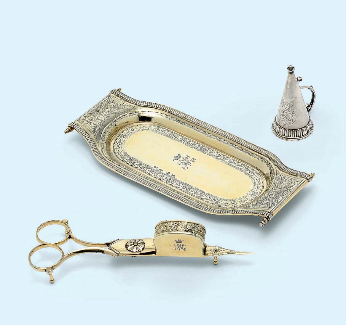 A PAIR OF RUSSIAN SILVER-GILT CANDLE-SNUFFERS AND STAND WITH AN EXTINGUISHER