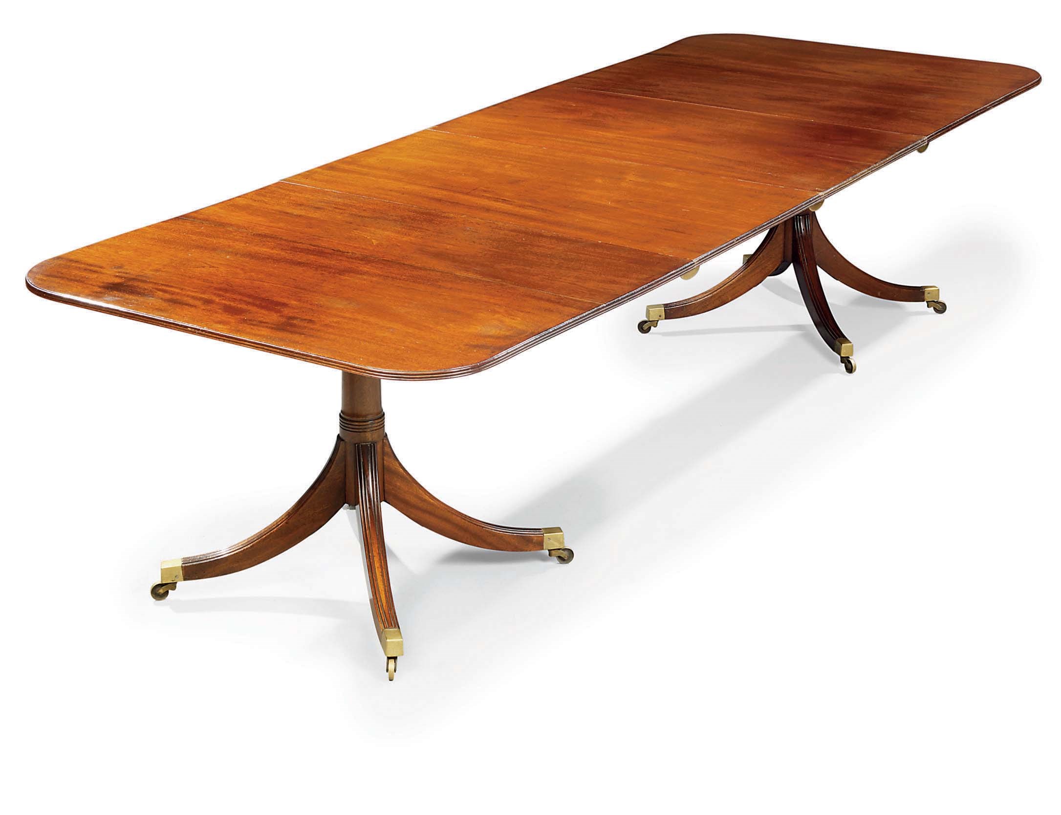 A GEORGE III-STYLE MAHOGANY DINING TABLE