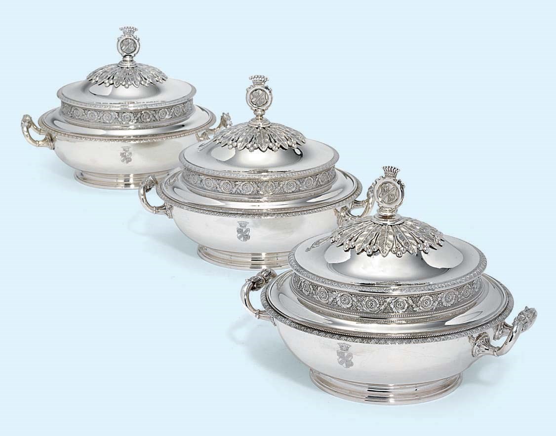 A SET OF THREE AUSTRIAN SILVER ENTREE-DISHES AND COVERS
