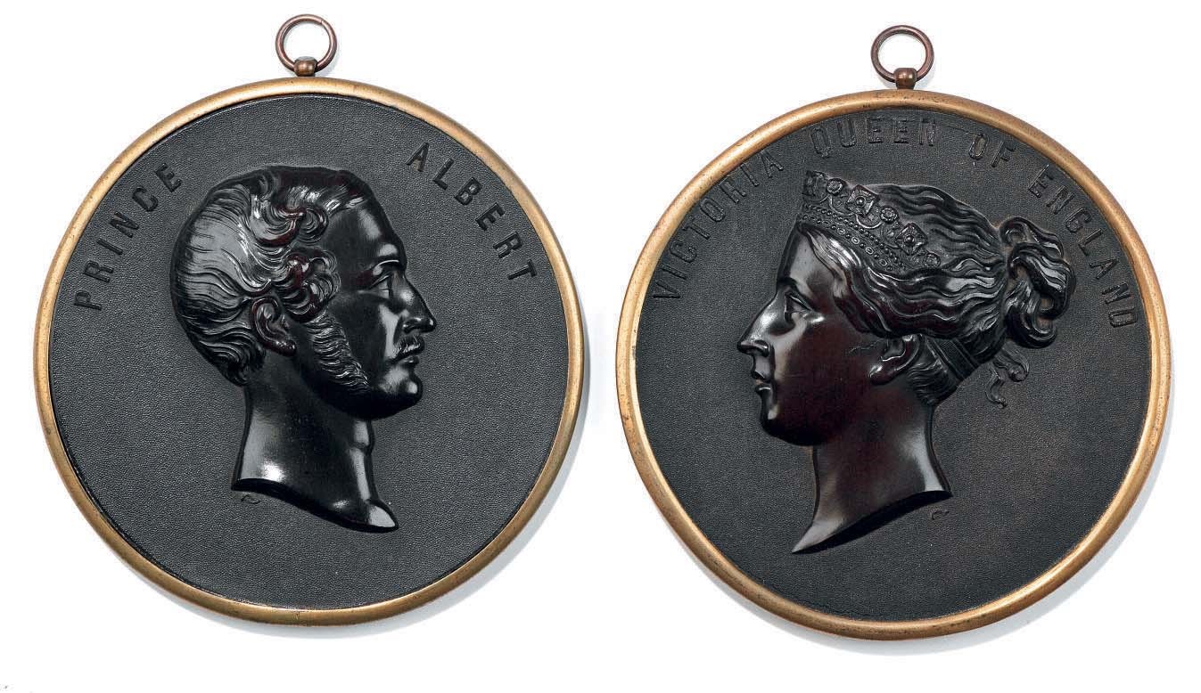 A PAIR OF VICTORIAN BOIS DURCI PORTRAIT PLAQUES OF QUEEN VICTORIA AND PRINCE ALBERT