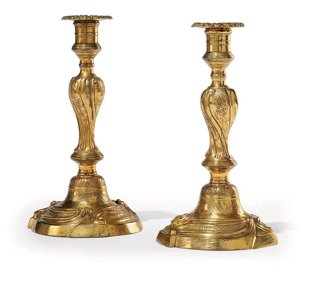 A PAIR OF LOUIS XV ORMOLU CANDLESTICKS
