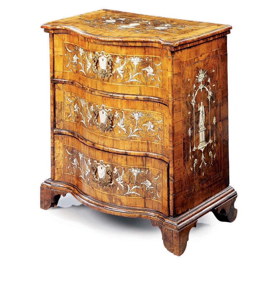A NORTH ITALIAN IVORY-INLAID WALNUT SERPENTINE COMMODE