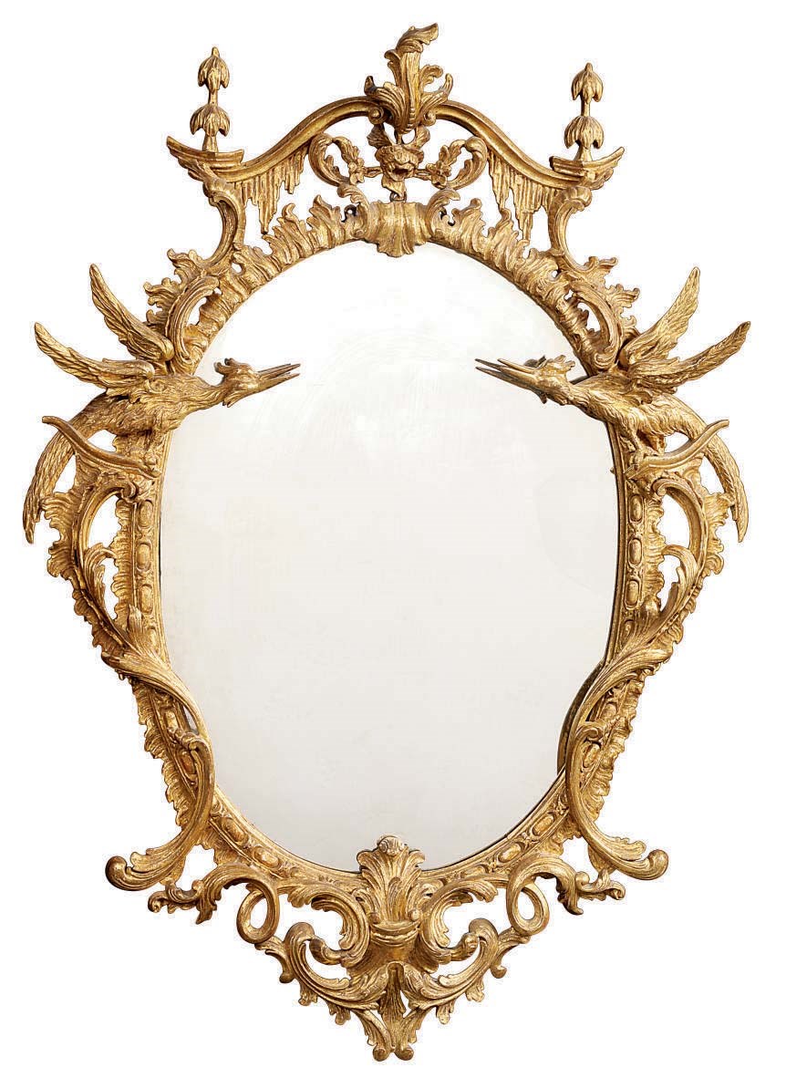 A GILTWOOD OVAL MIRROR