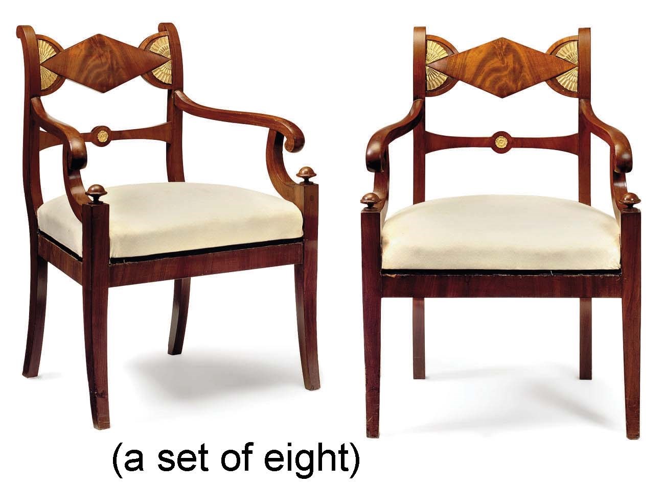 A SET OF EIGHT SWEDISH REPOUSSE BRASS-MOUNTED MAHOGANY DINING-CHAIRS