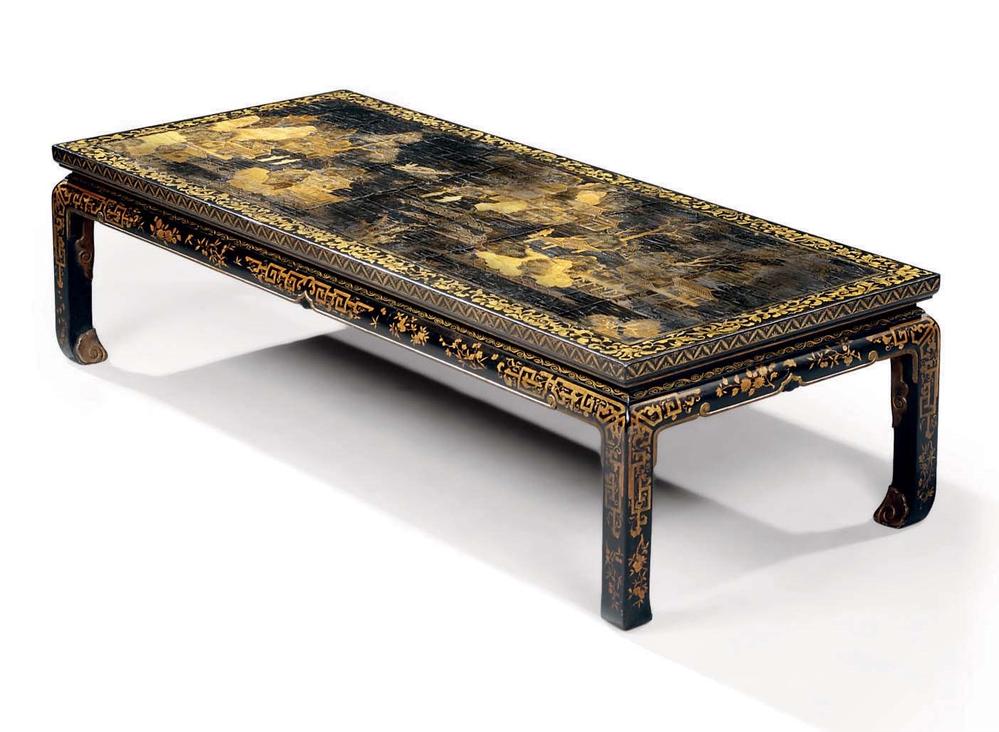 A BLACK AND GILT-LACQUERED AND JAPANNED LOW TABLE