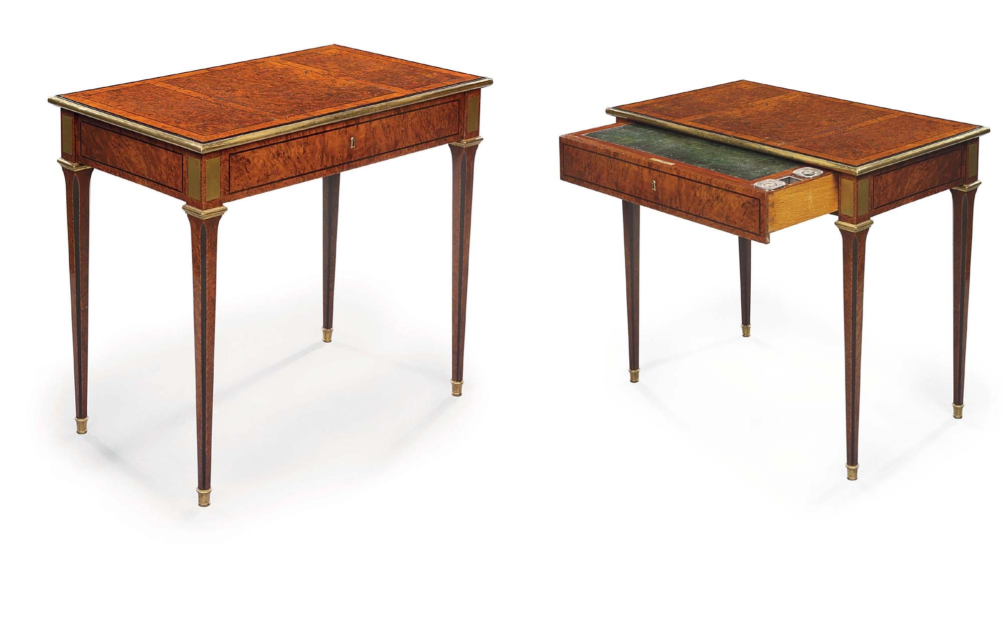 A LOUIS XVI ORMOLU-MOUNTED, BRASS AND EBONY-INLAID AMBOYNA TABLE-A-ECRIRE