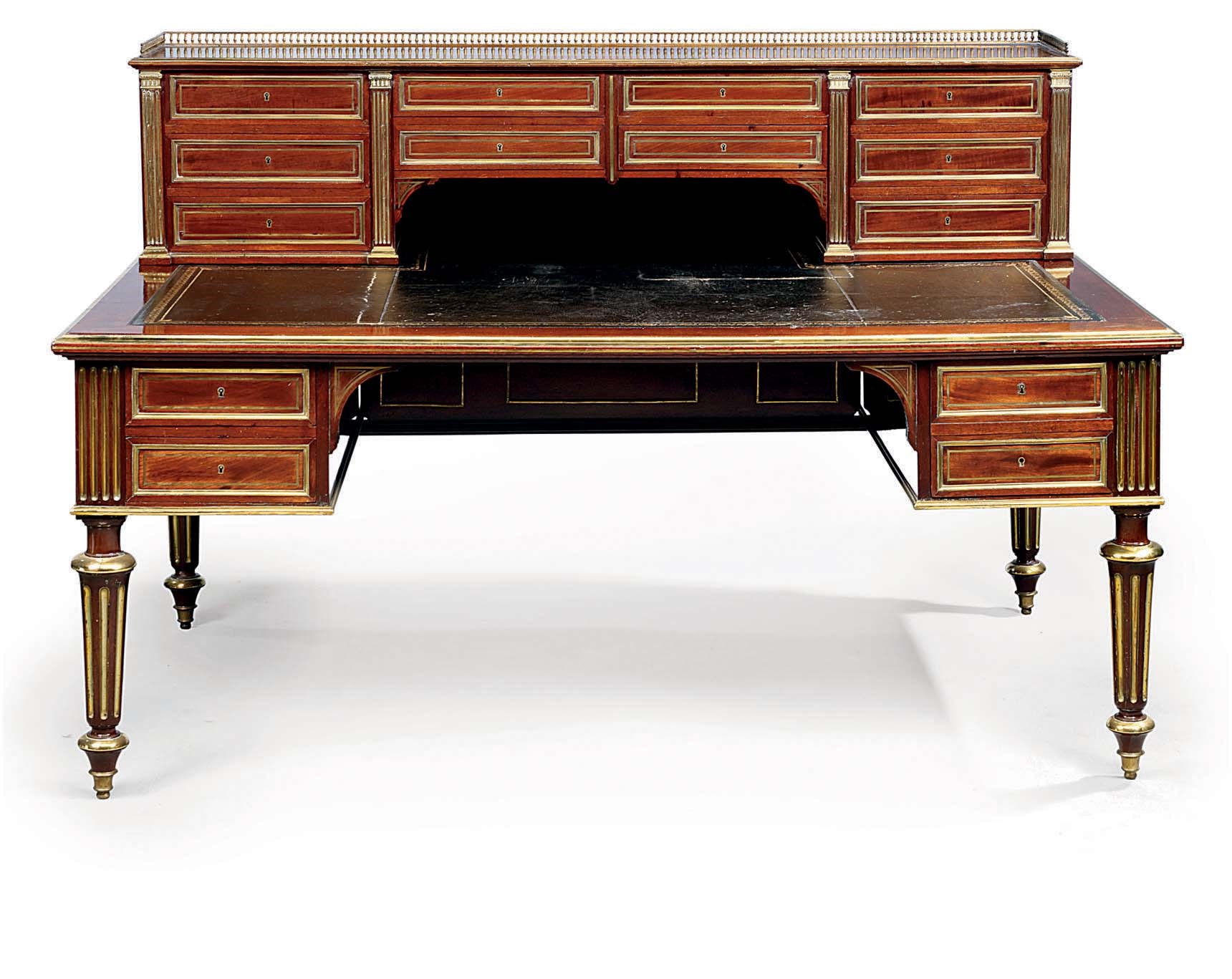 A FRENCH ORMOLU AND BRASS-MOUNTED MAHOGANY BUREAU A GRADIN