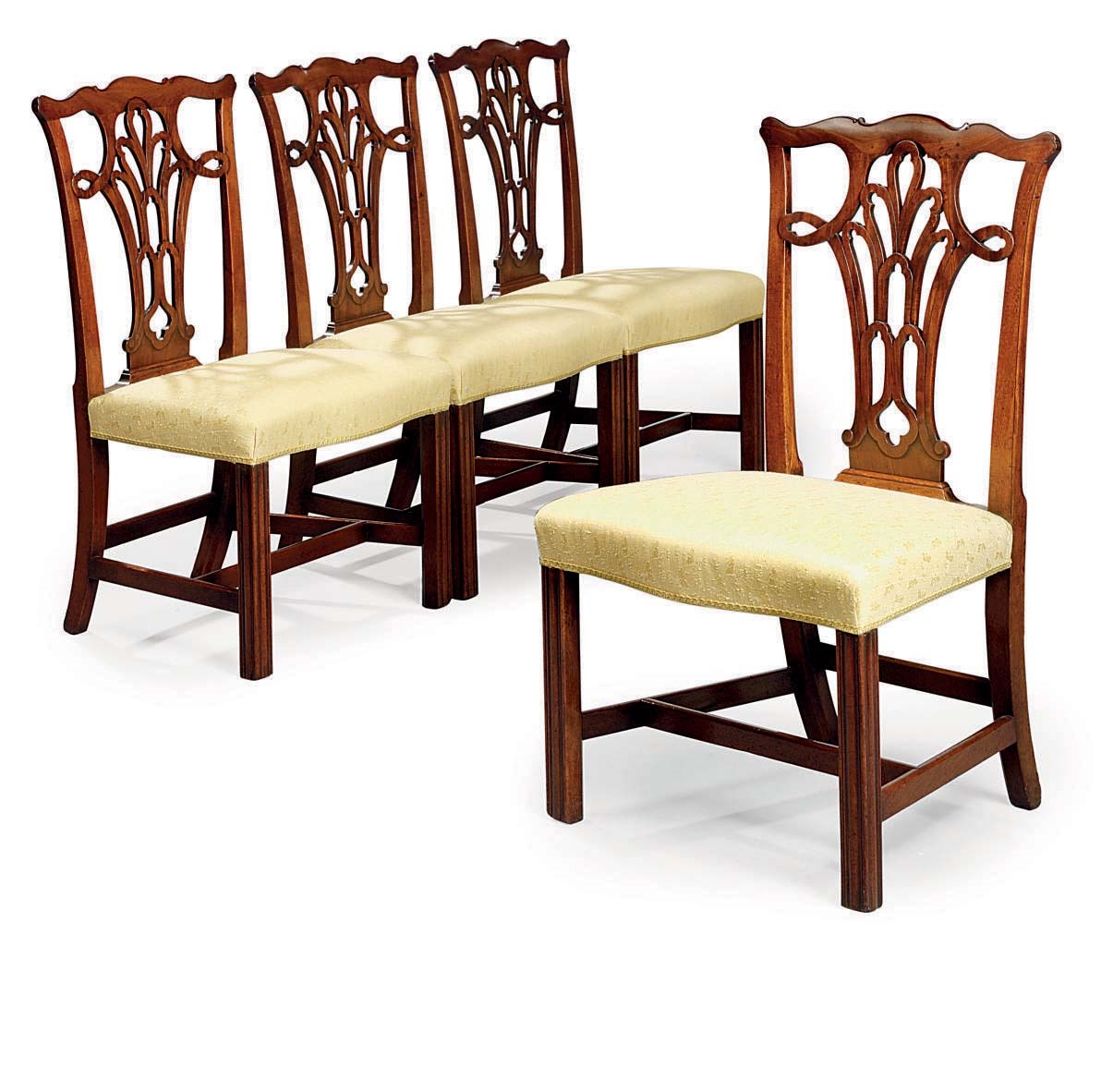 A SET OF FOUR GEORGE III MAHOGANY DINING-CHAIRS