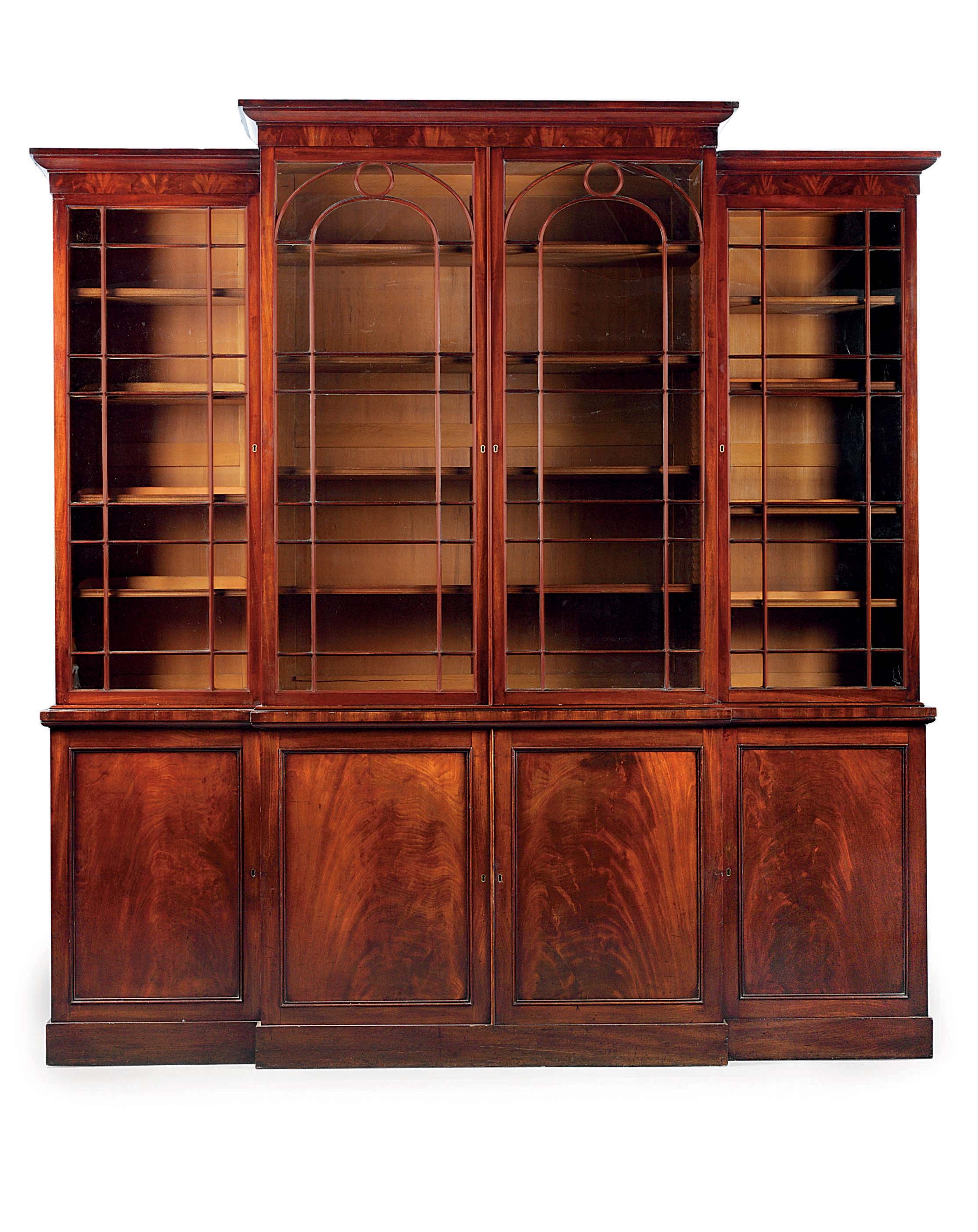 A REGENCY MAHOGANY BREAKFRONT BOOKCASE