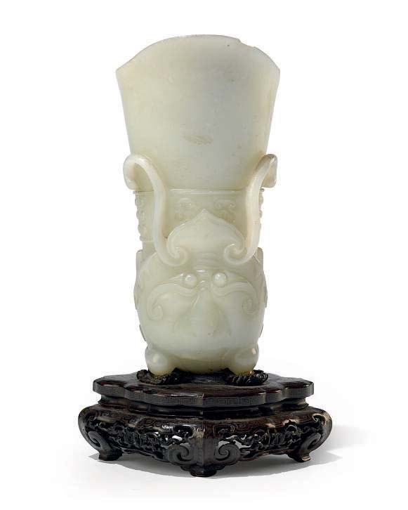 A CHINESE WHITE JADE RHYTON CEREMONIAL CUP