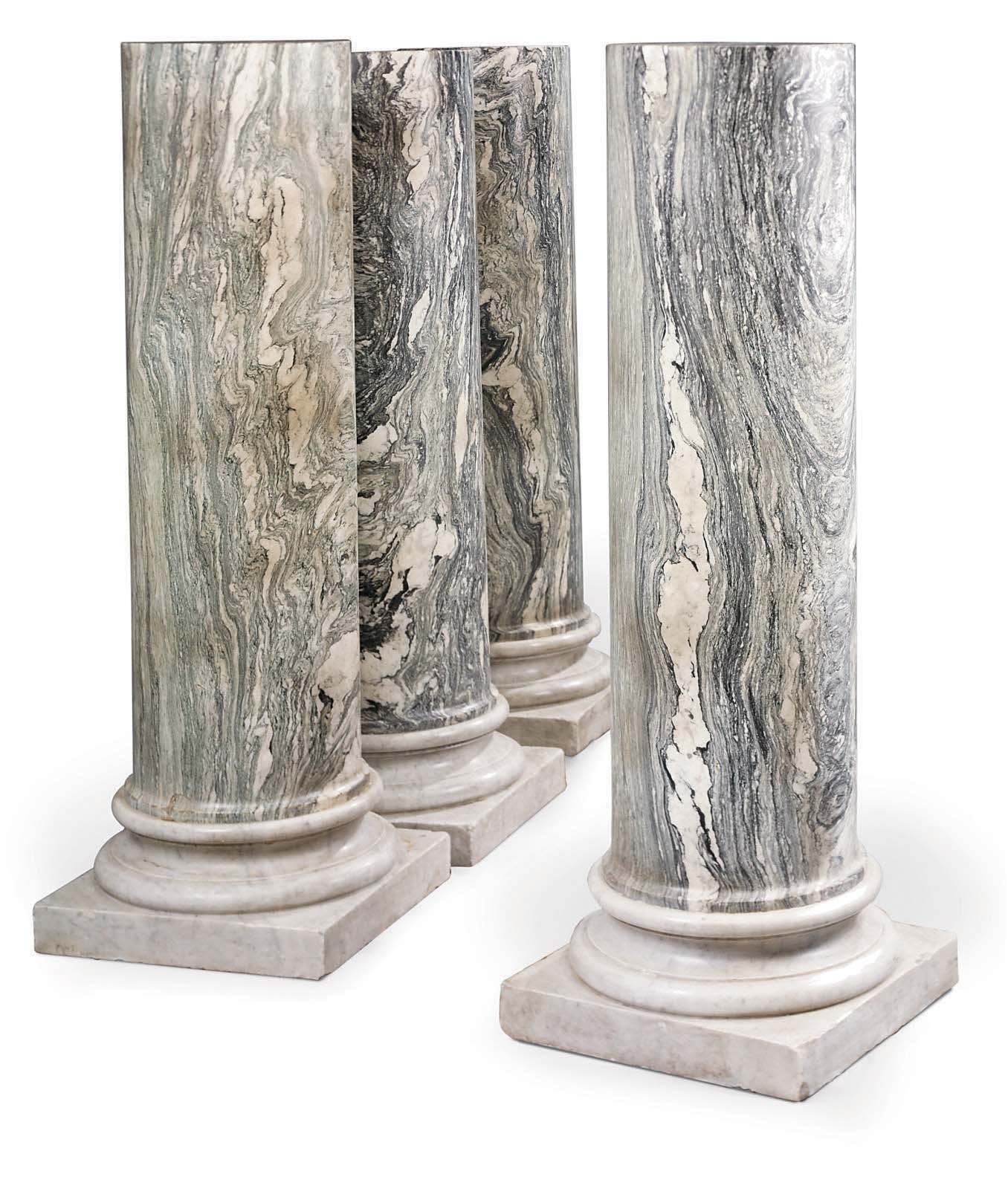 A SET OF FOUR ITALIAN CIPOLLINO MARBLE COLUMN PEDESTALS