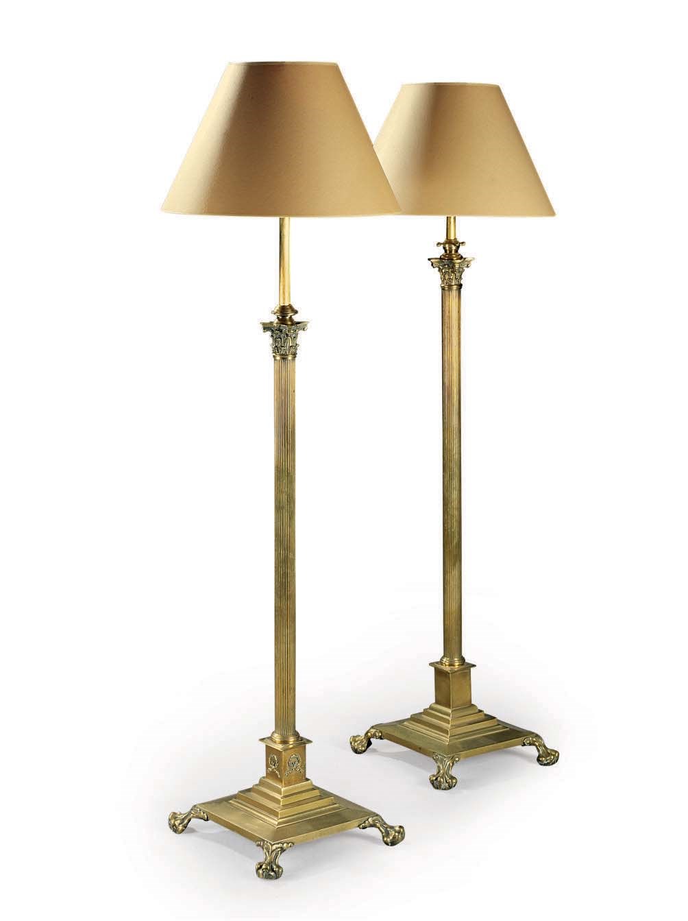 TWO LATE VICTORIAN POLISHED BRASS ADJUSTABLE STANDARD LAMPS