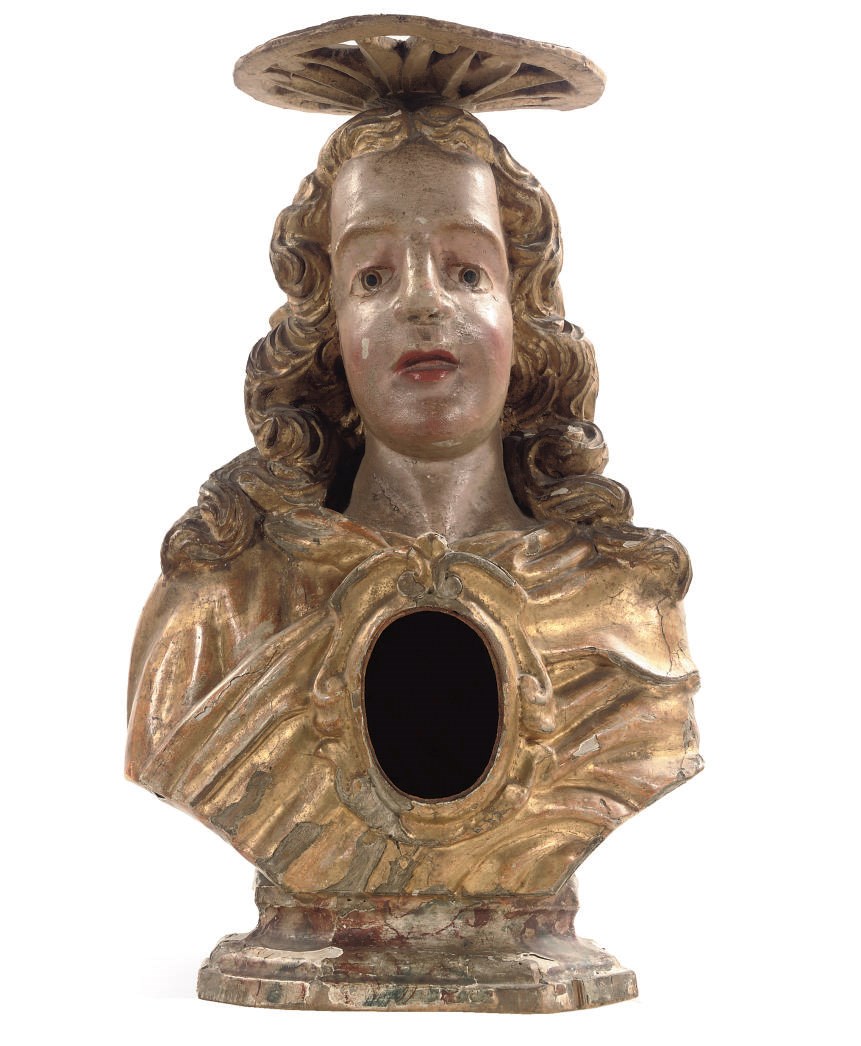 A GILT AND POLYCHROME CARVED LIMEWOOD RELIQUARY BUST OF A FEMALE SAINT