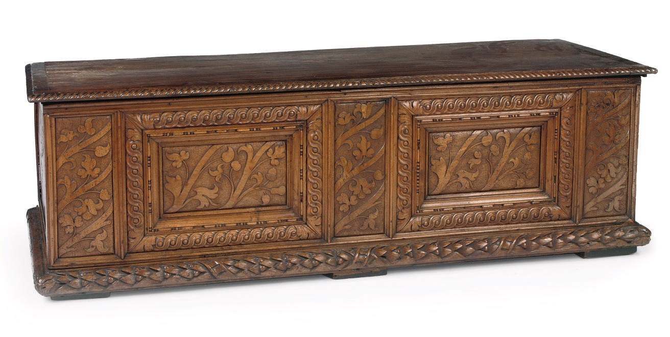 An Italian walnut and elm cassone
