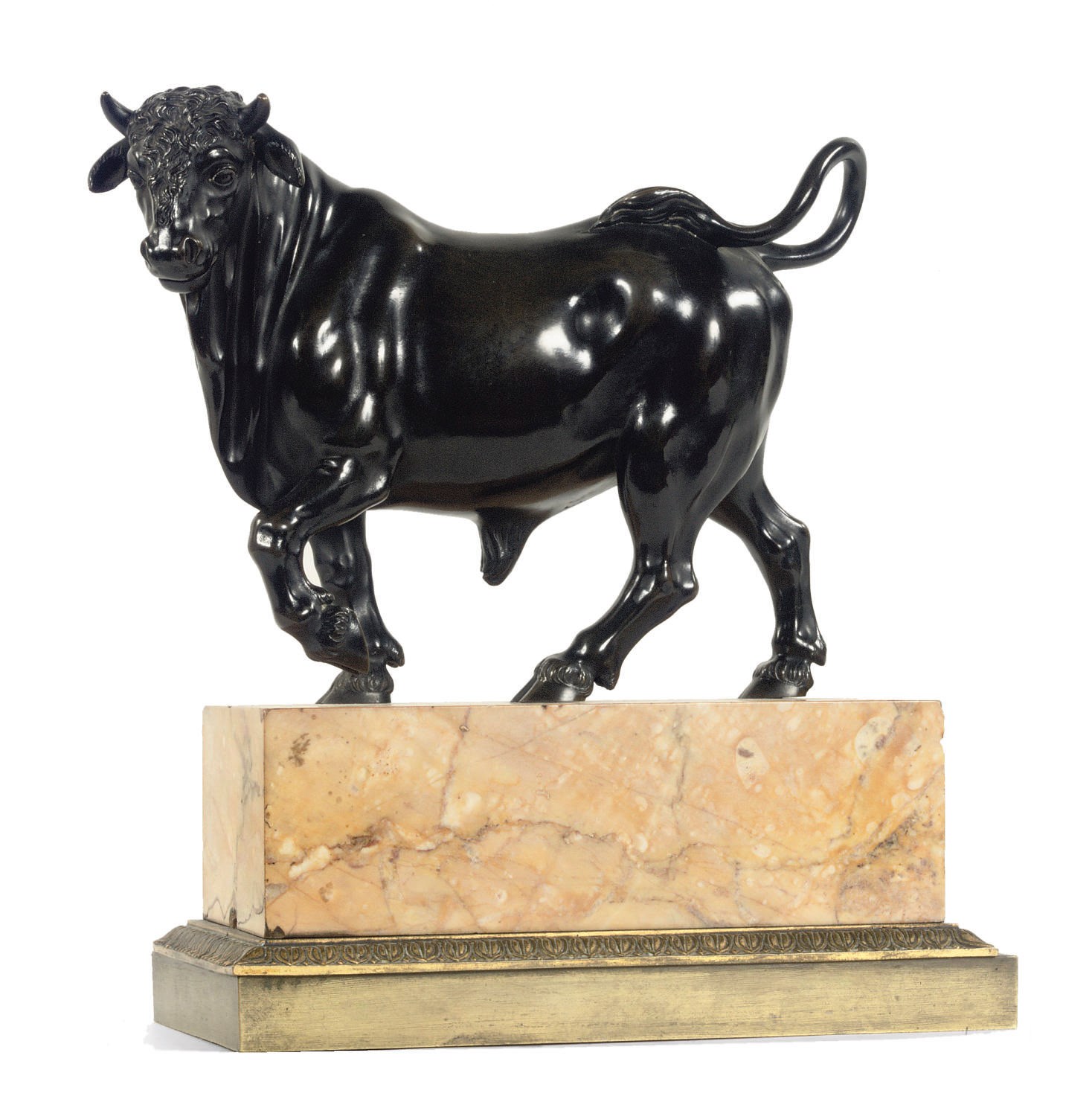 A bronze model of a pacing bull