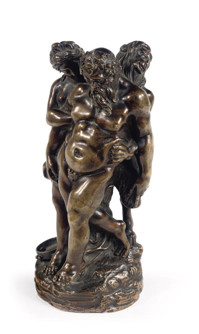 A BRONZE GROUP OF SILENUS, PAN AND A NEREID