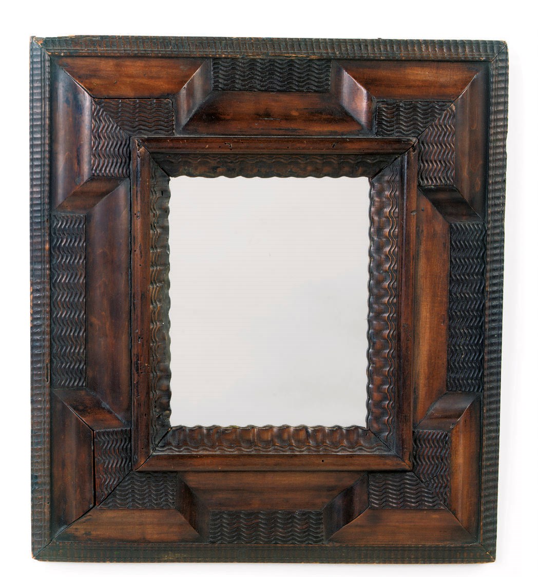 A GERMAN STAINED FRUITWOOD MIRROR