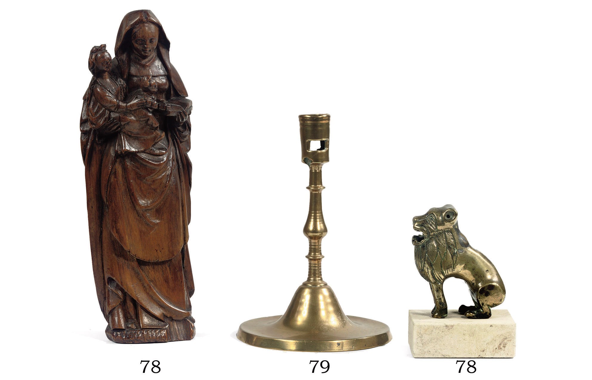 A BRASS NOZZLE CANDLESTICK