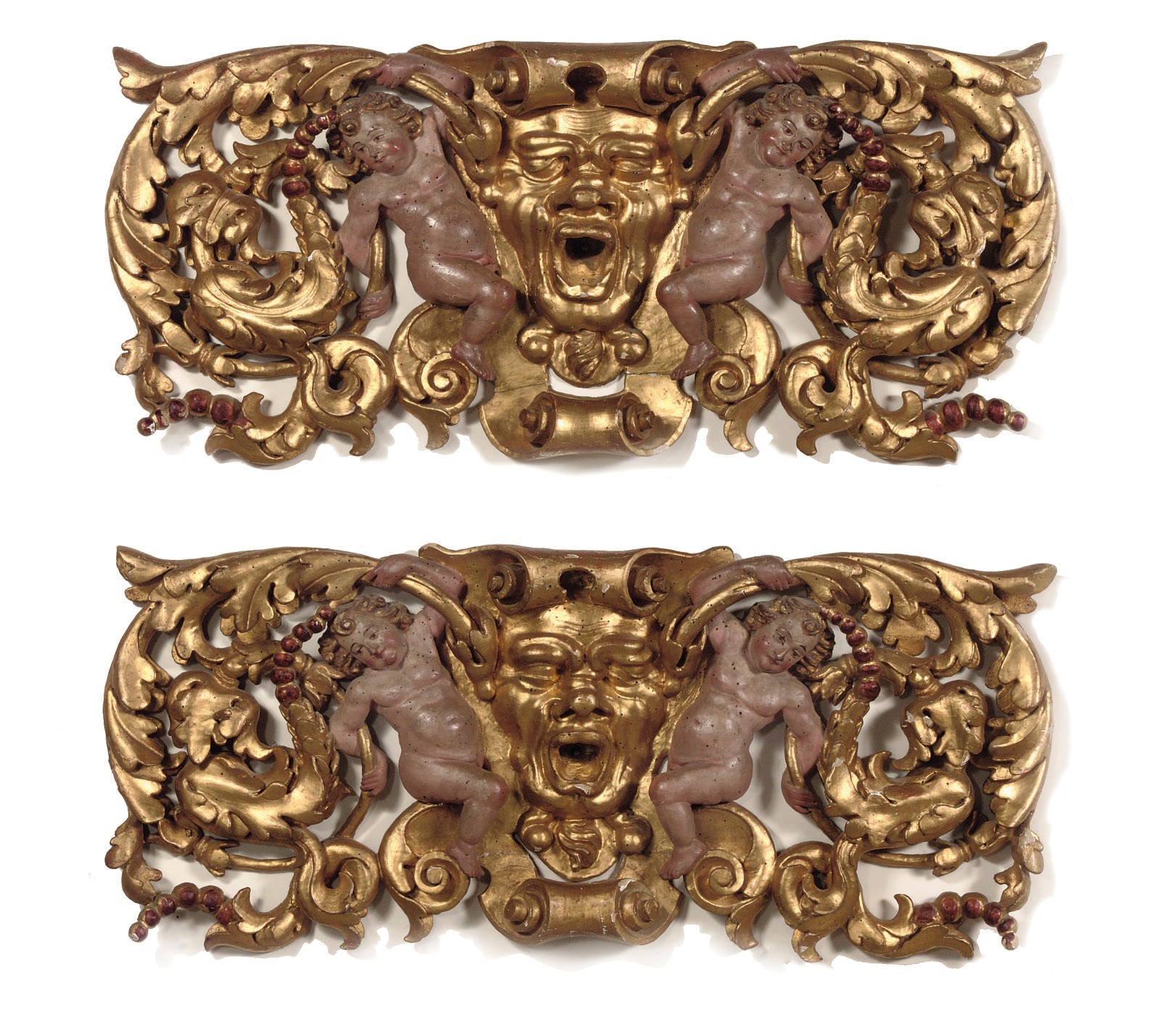 A pair of gilt and polychrome carved poplar high reliefs