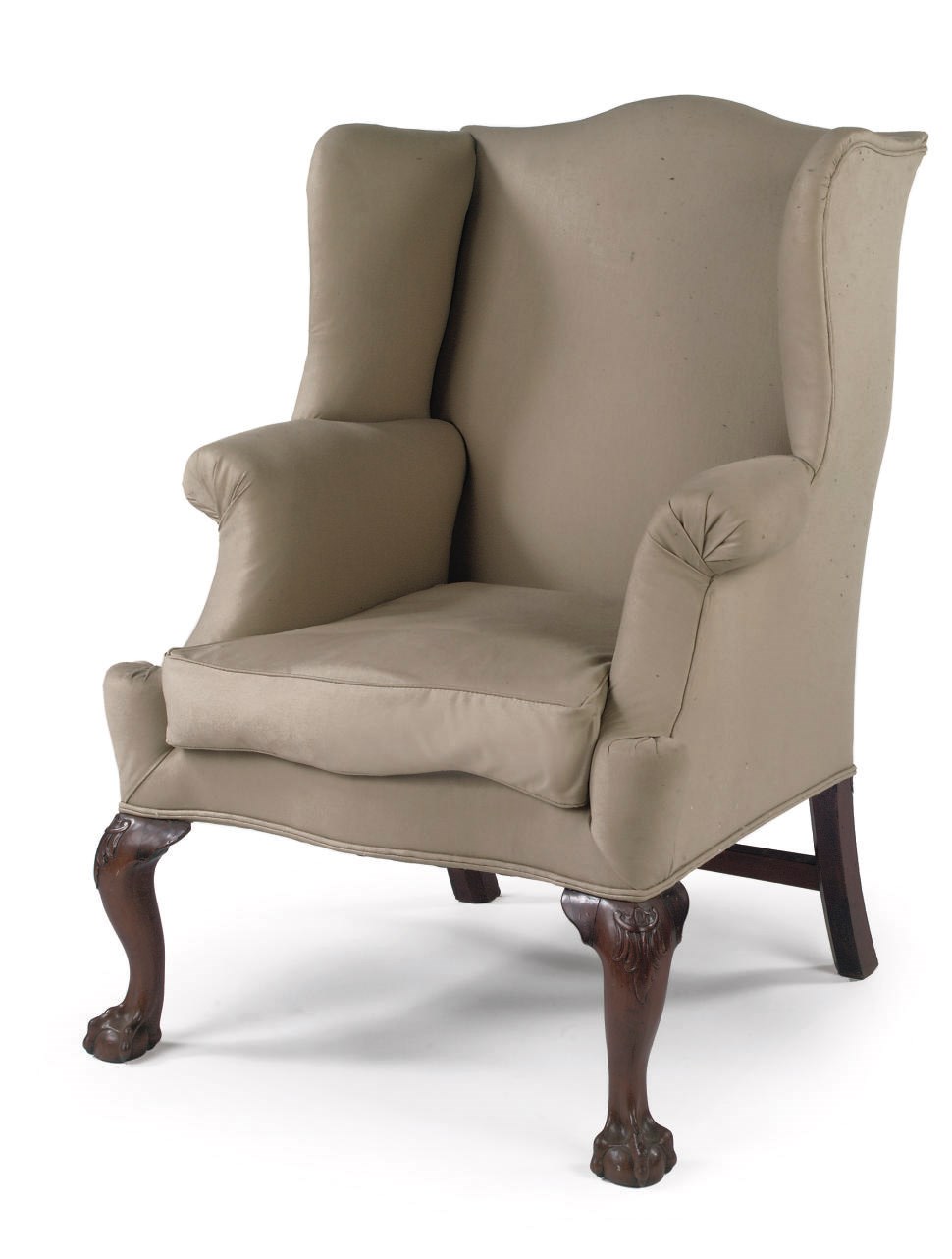 An English mahogany wing armchair