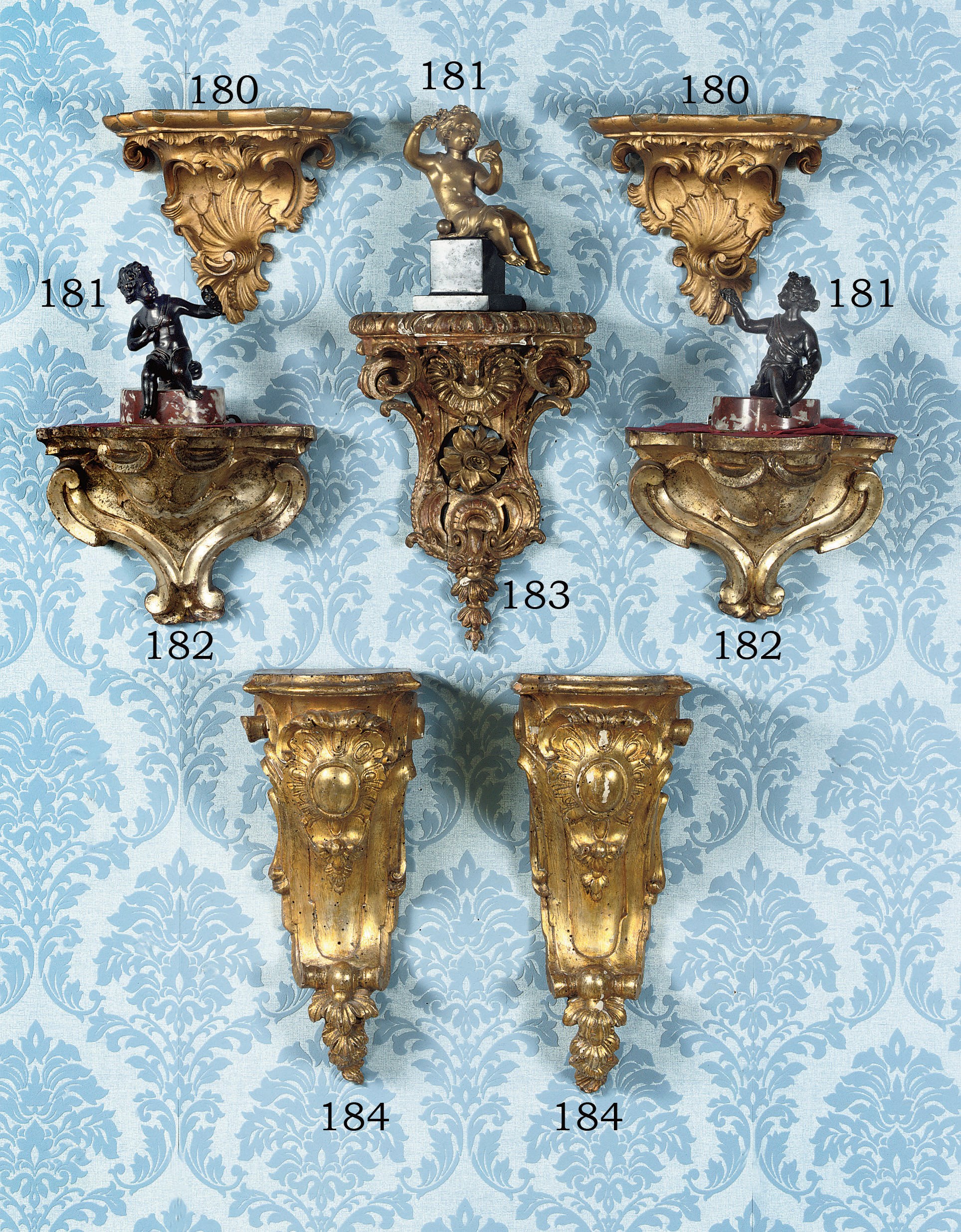 A pair of Dutch giltwood wall brackets