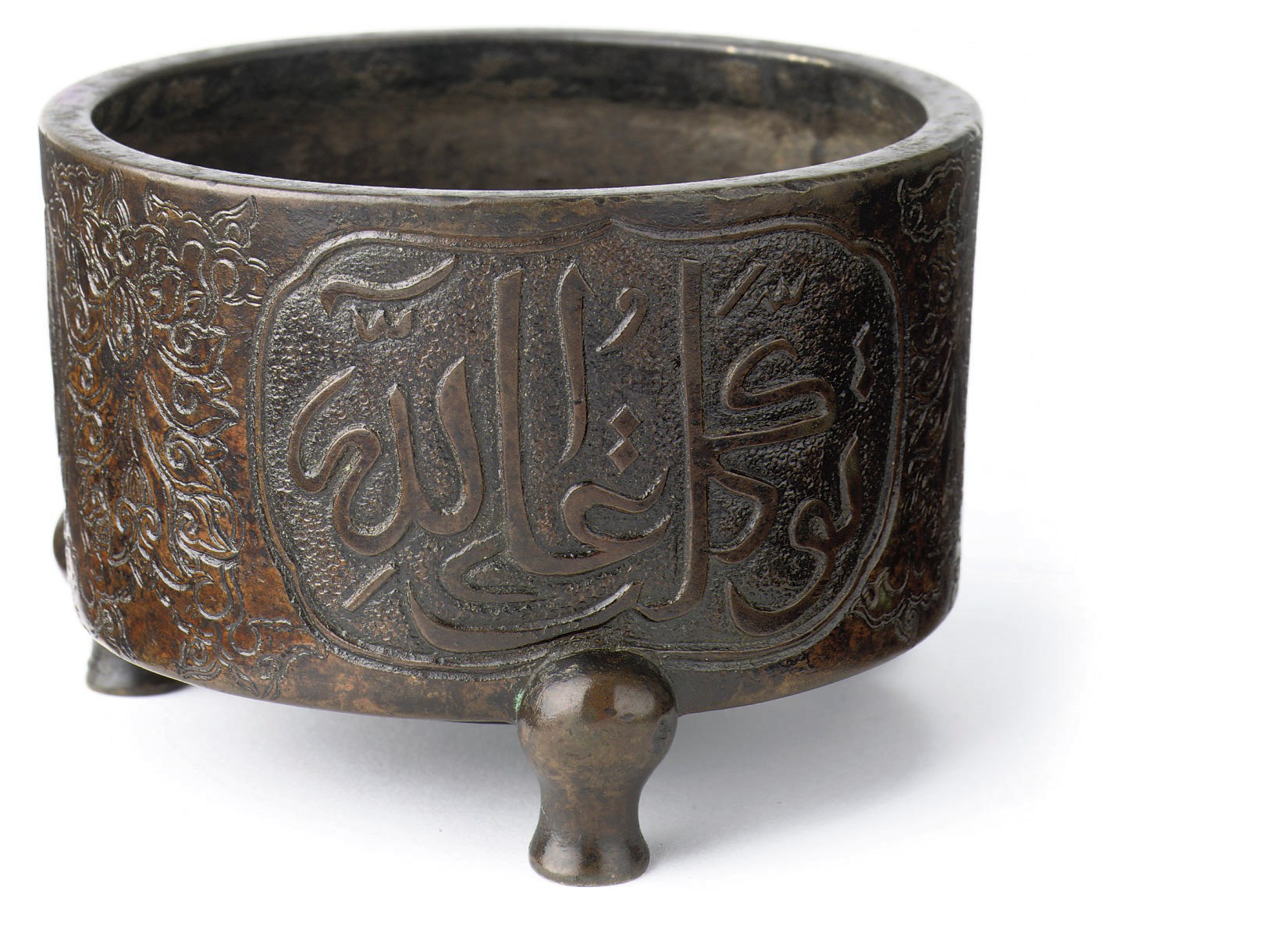 A Chinese bronze tripod incense burner
