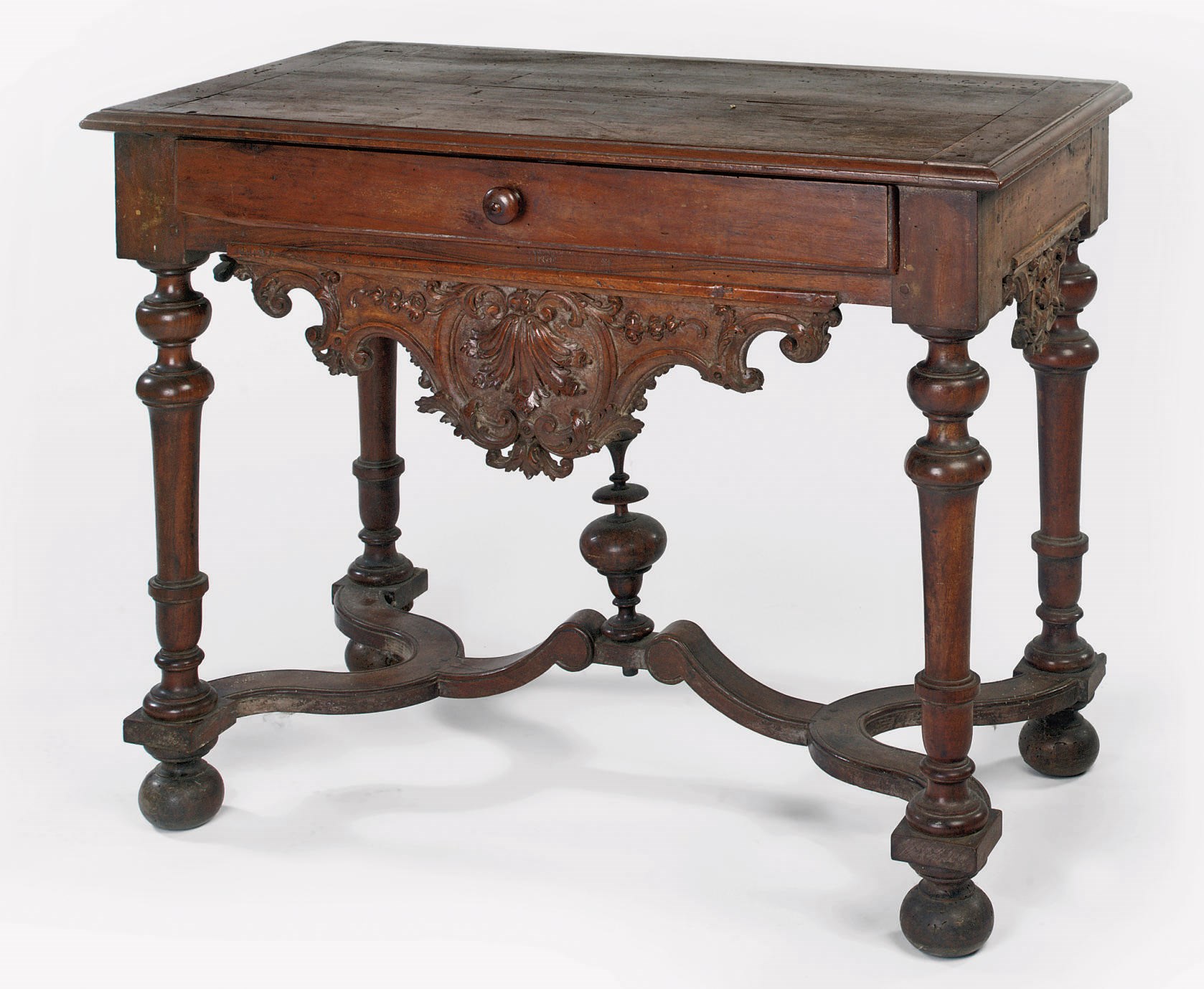 A SOUTH EUROPEAN WALNUT SIDE TABLE