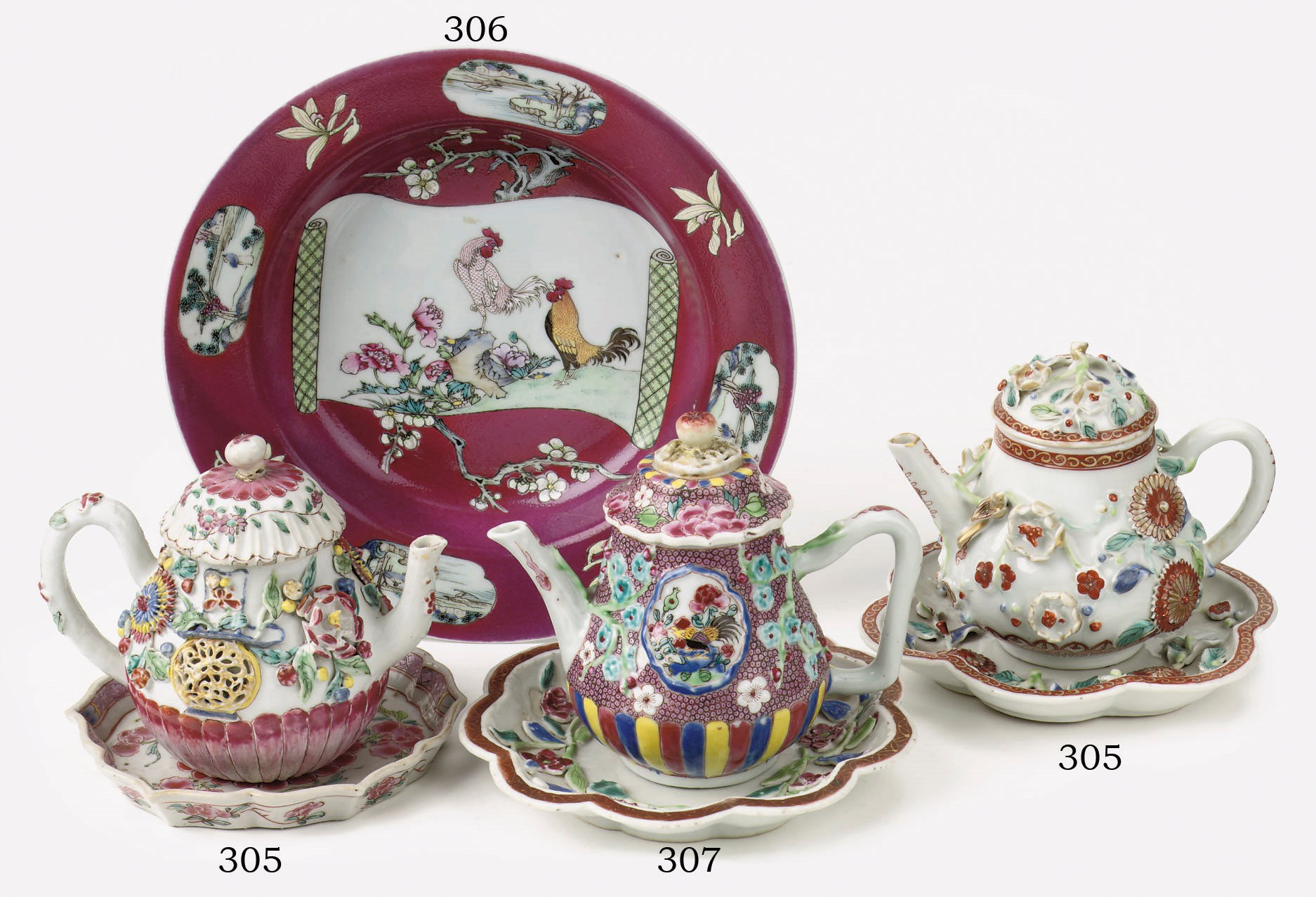 Two Chinese famille rose teapots, covers and stands