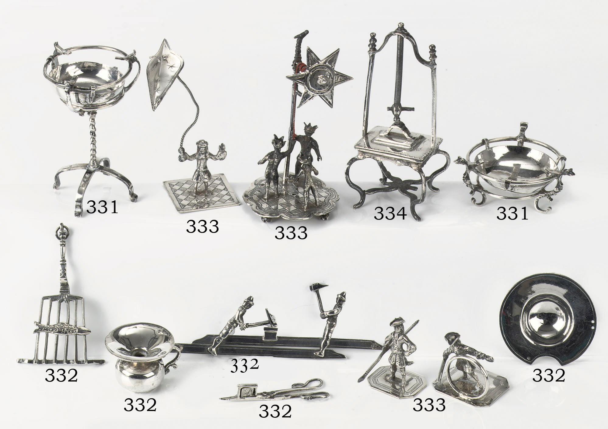 A set of four Dutch silver miniatures toys