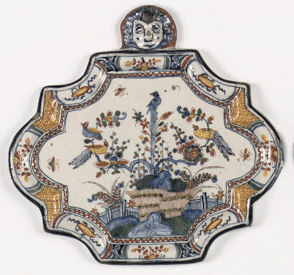 A Dutch Delft polychrome Chinoiserie plaque