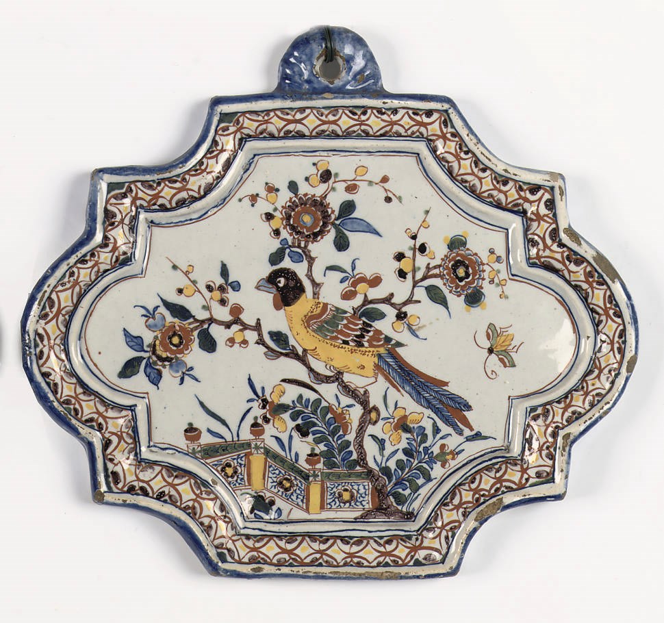 A Dutch Delft polychrome Chinoiserie plaque