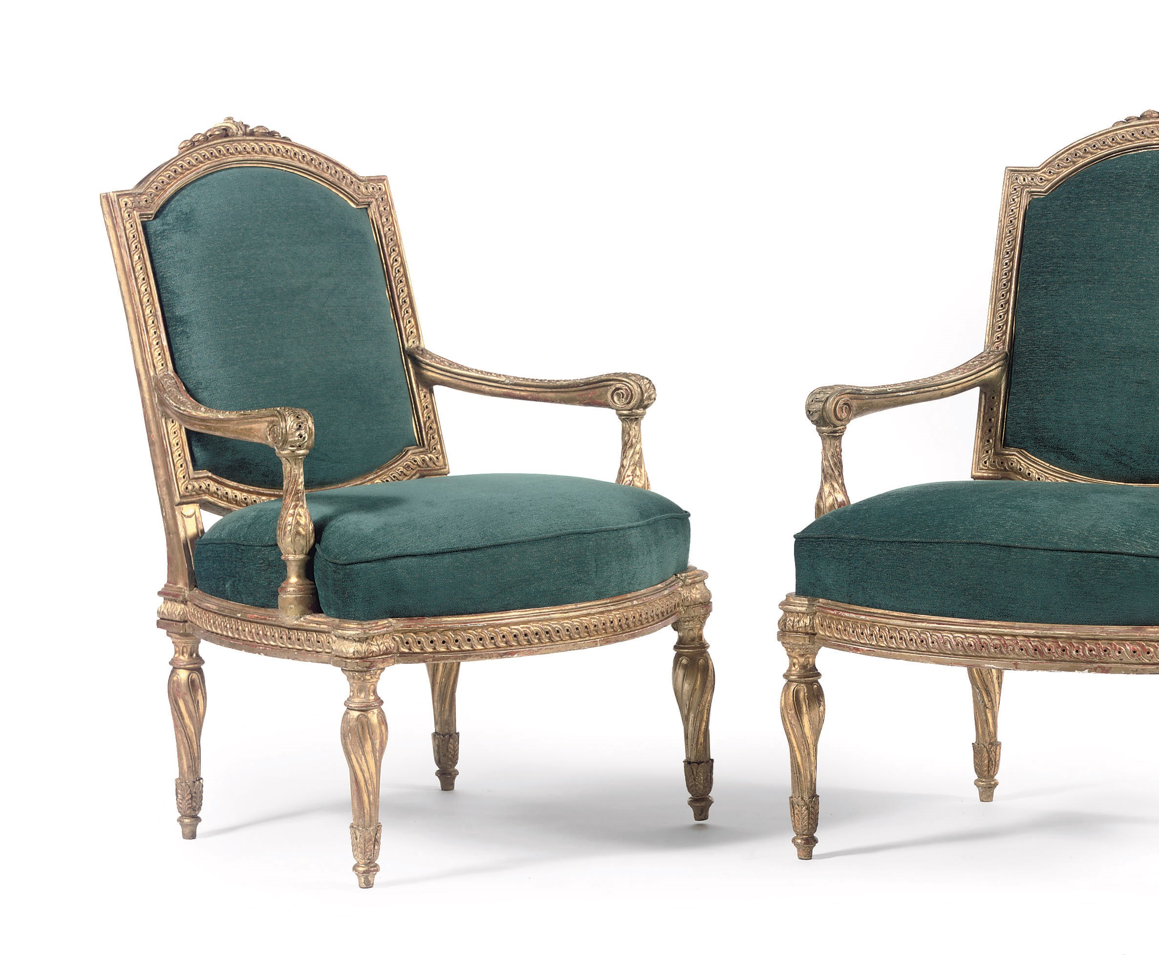 A pair of North Italian giltwood fauteuils