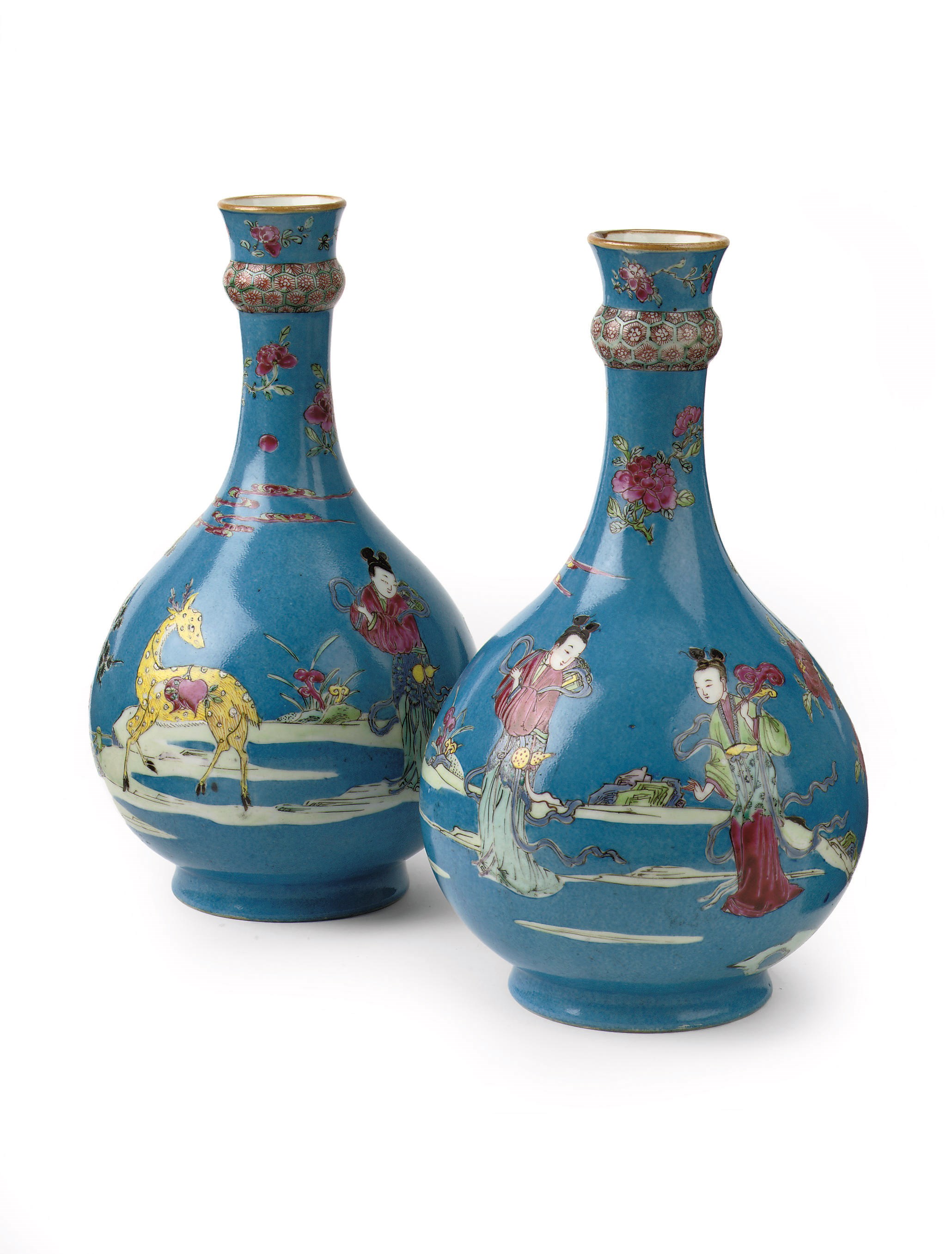 A rare pair of Chinese famille rose turquoise ground bottle vases