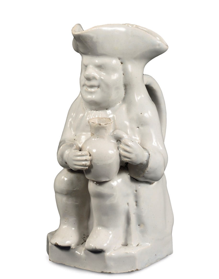 A Dutch Delft white-glazed Toby jug