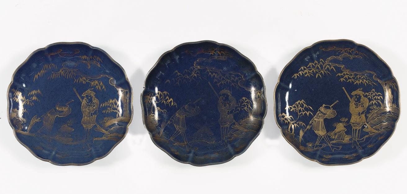 A set of three Japanese powder blue and gilt Namban dishes
