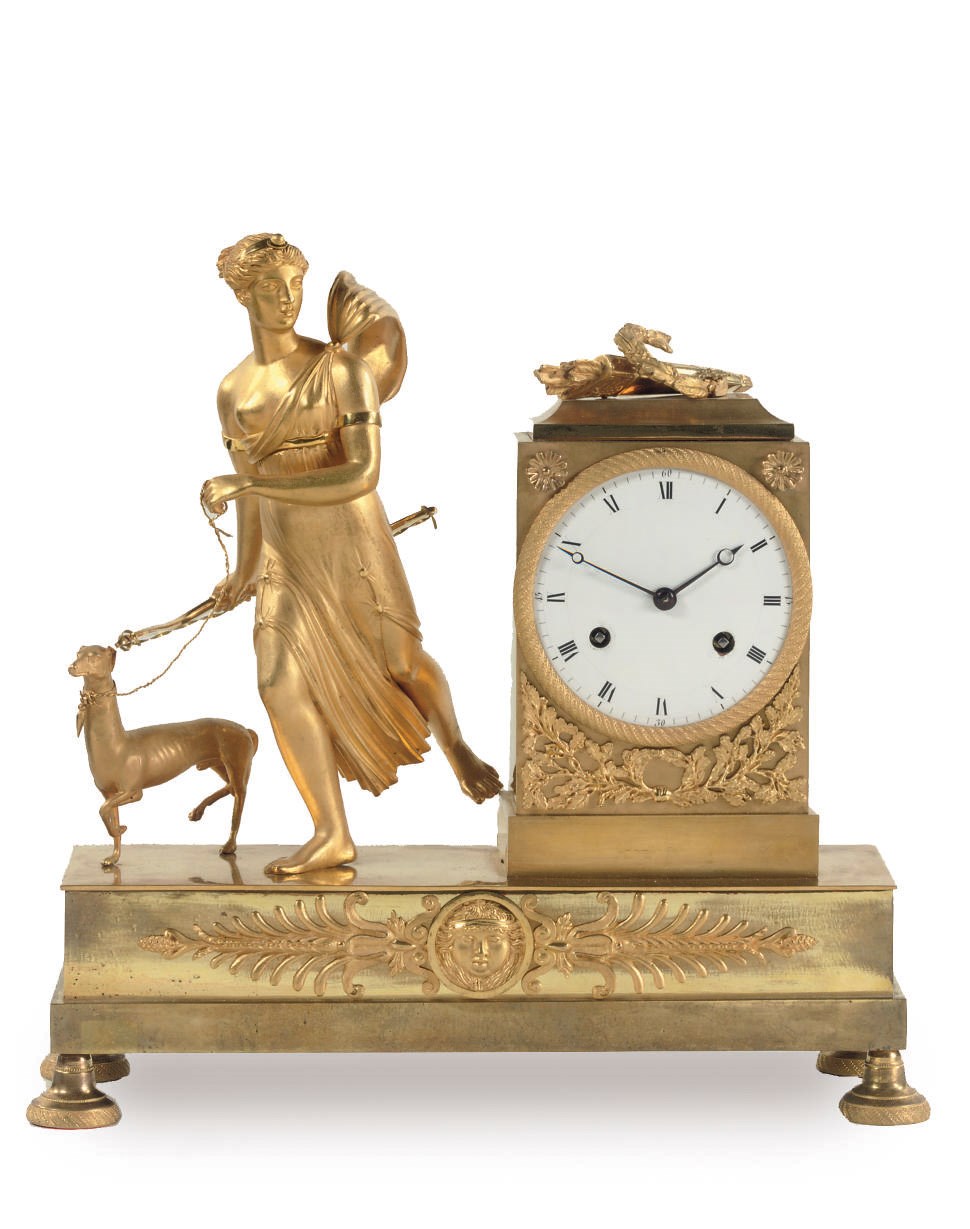 AN EMPIRE FIGURAL STRIKING MANTEL CLOCK DEPICTING 'DIANA THE HUNTRESS'