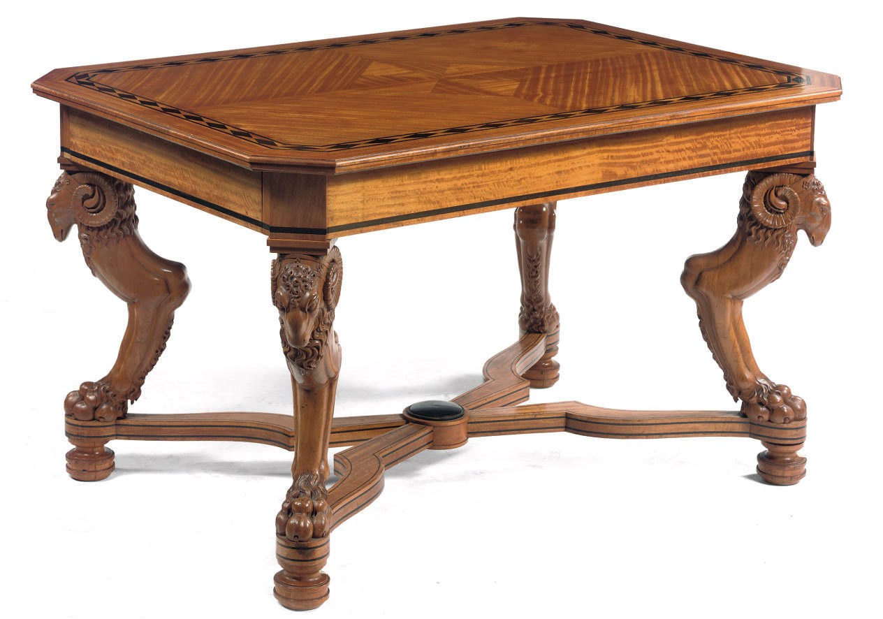 A North Eurpean satinwood and ebony extending dining table
