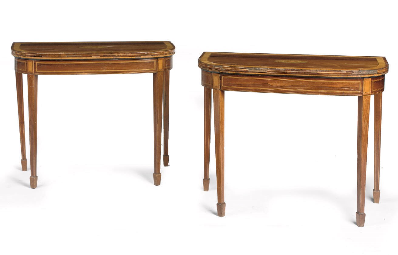 A pair of English rosewood, satinwood and fruitwood games tables