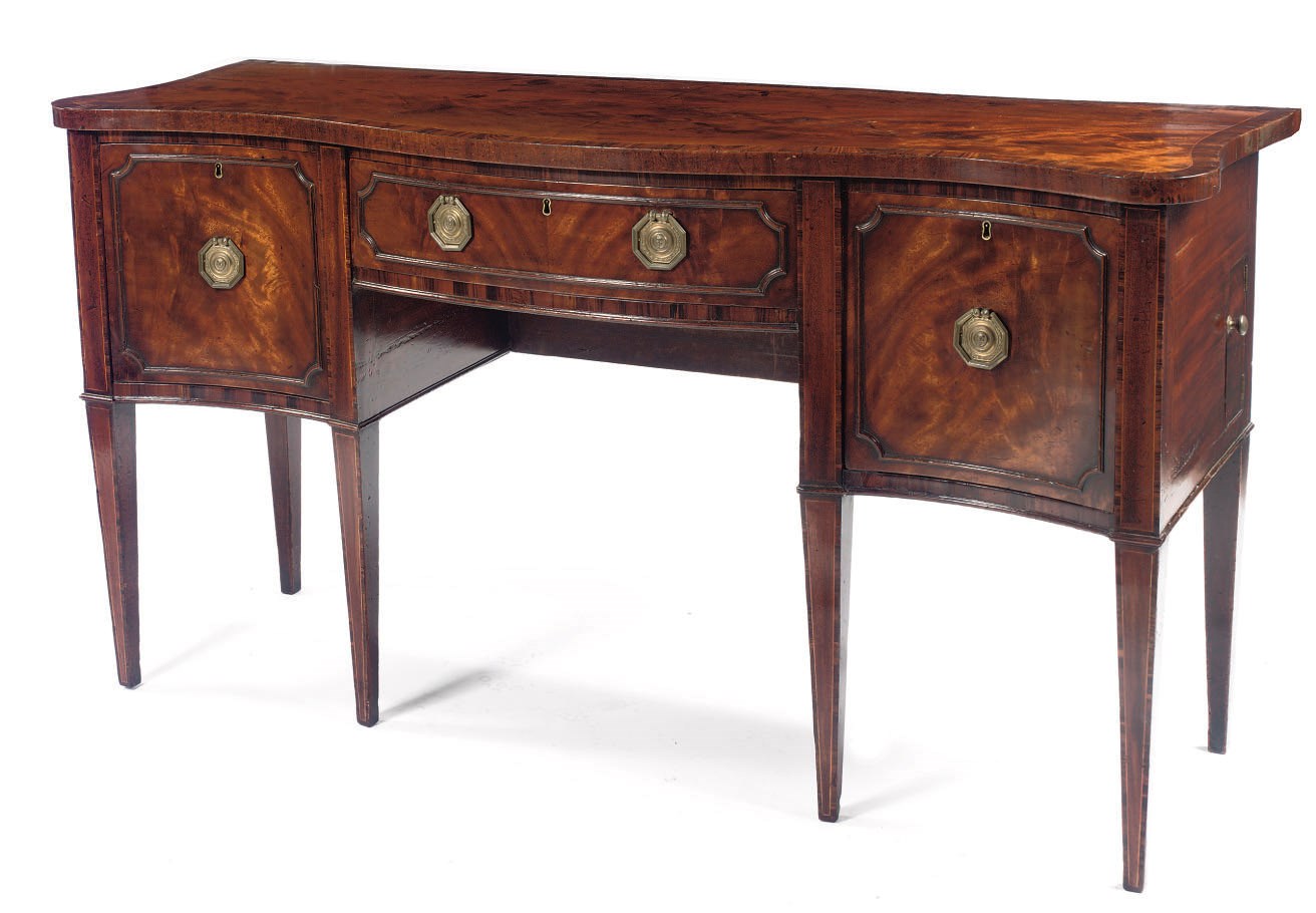 A George III mahogany and rosewood sideboard