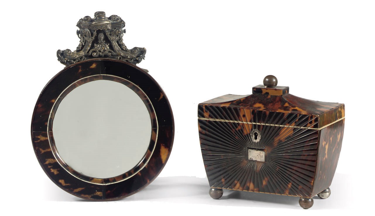 AN ENGLISH WHITE METAL-MOUNTED TORTOISESHELL AND IVORY TEA CADDY