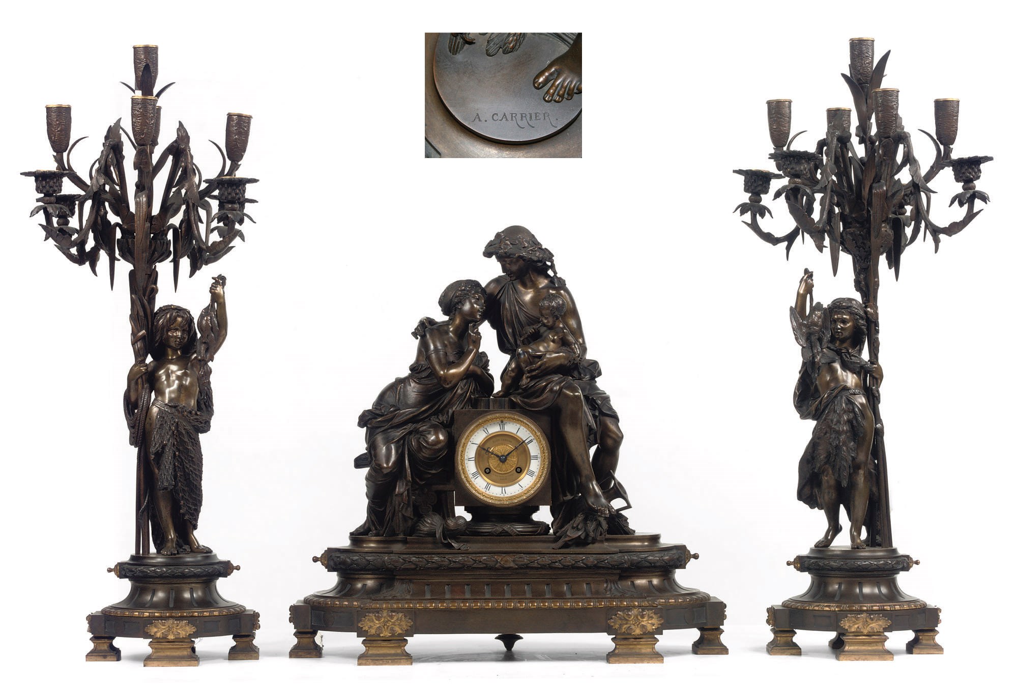 A NAPOLEON III PARCEL-GILT AND PATINATED BRONZE FIGURAL THREE PIECE CLOCK GARNITURE