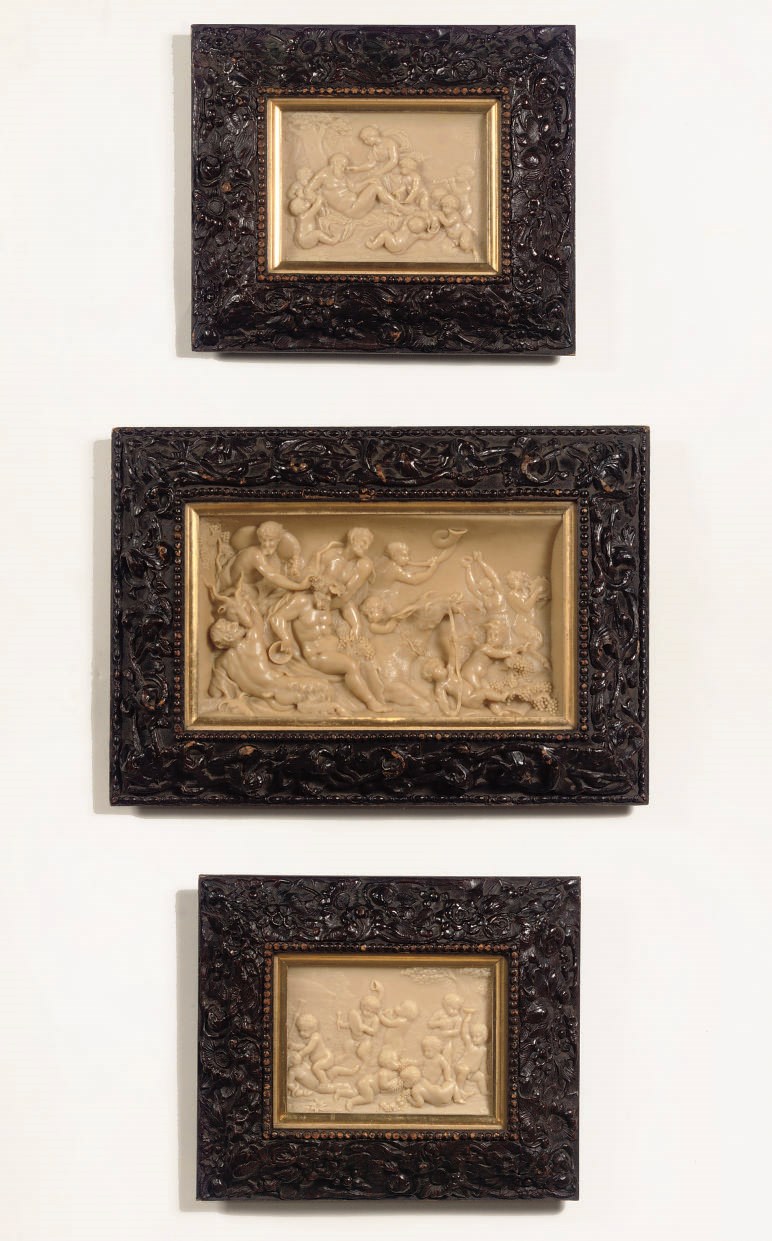 THREE VARIOUS WAX RELIEFS DEPICTING BACCHUS, SATYRS AND PUTTI