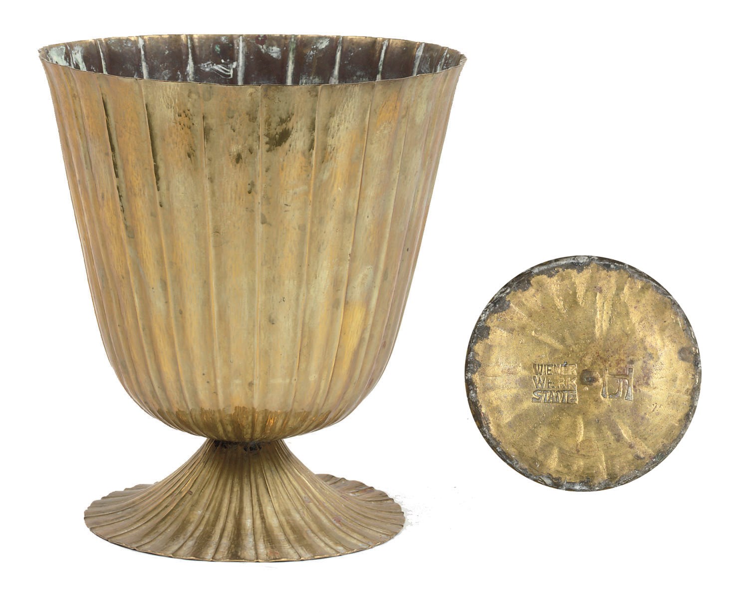 A HAMMERED BRASS VASE