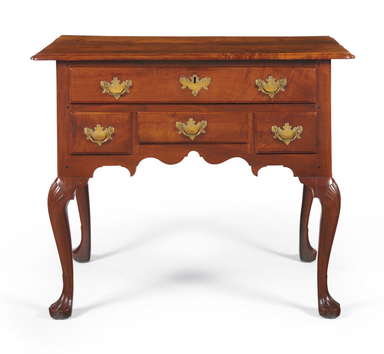A Queen Anne Carved and Figured Cherrywood Dressing Table