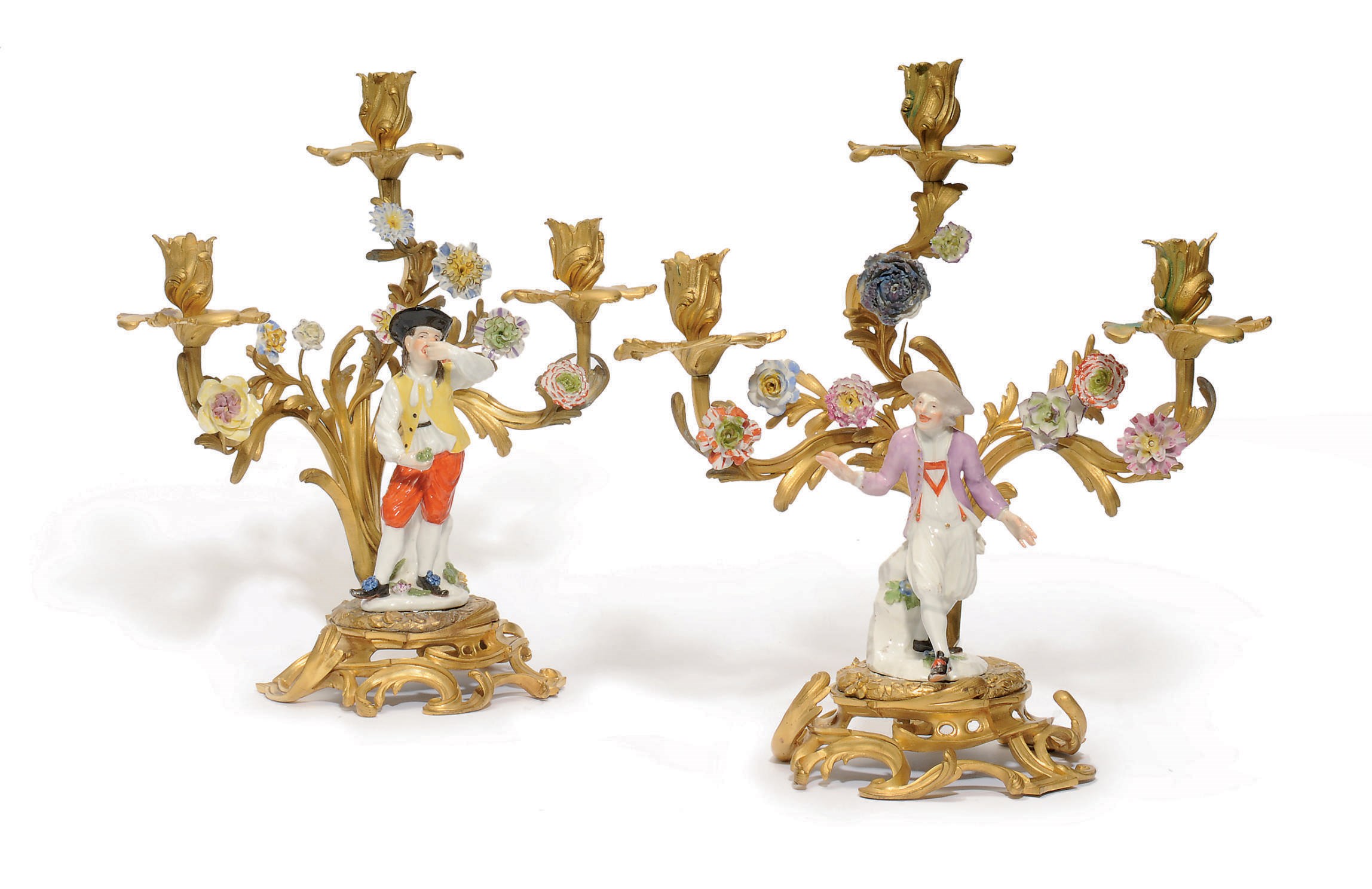 TWO MEISSEN FIGURES MOUNTED ON ORMOLU CANDELABRA BASES