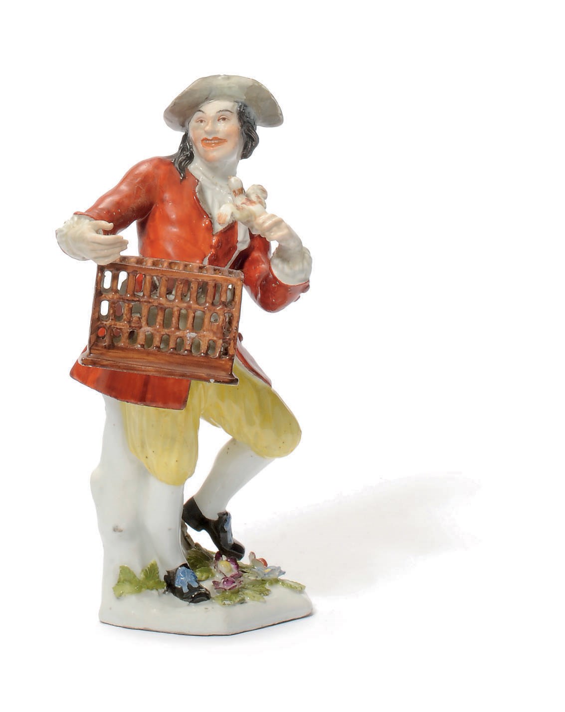 A MEISSEN FIGURE OF A BIRD SELLER