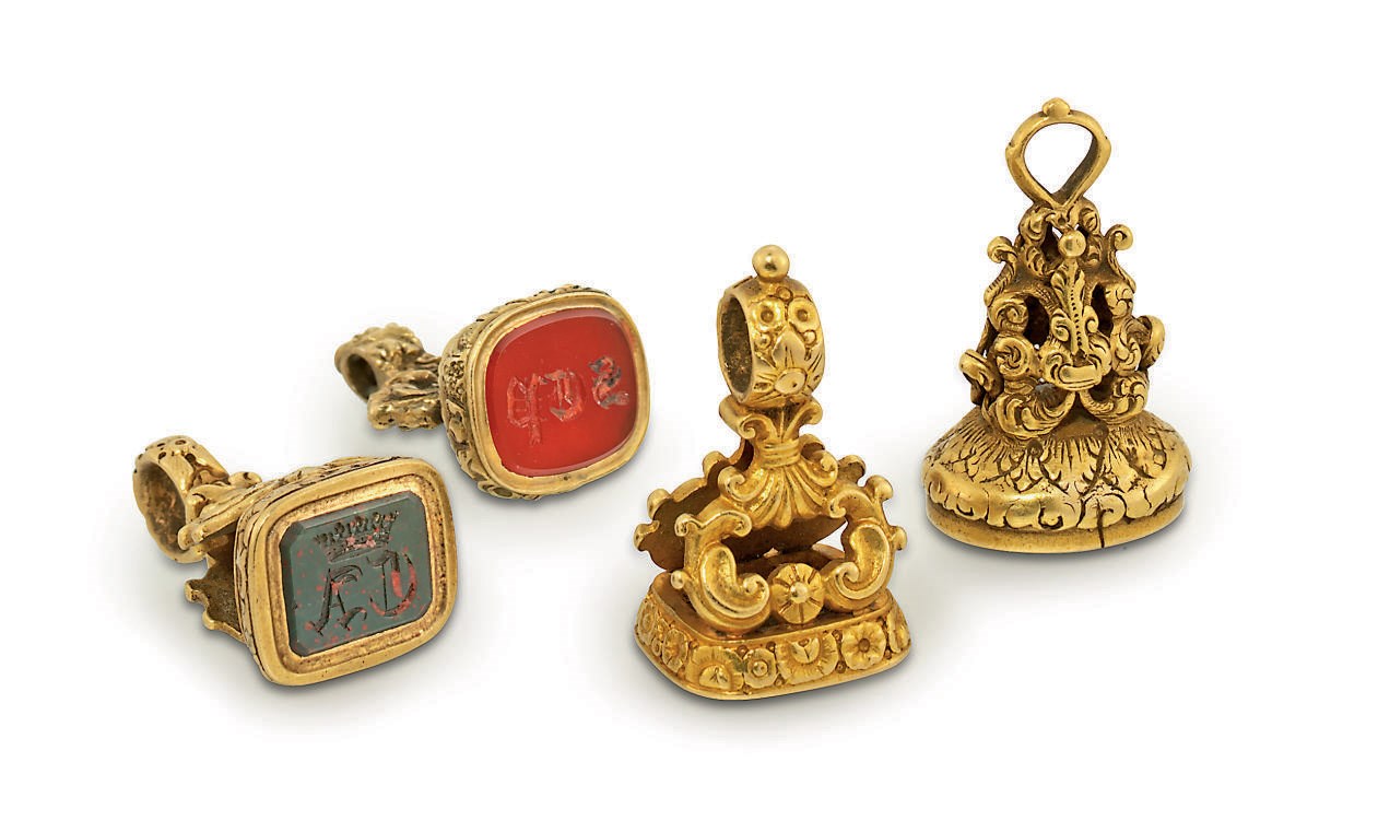 FOUR CONTINENTAL GOLD-MOUNTED HARDSTONE FOB-SEALS