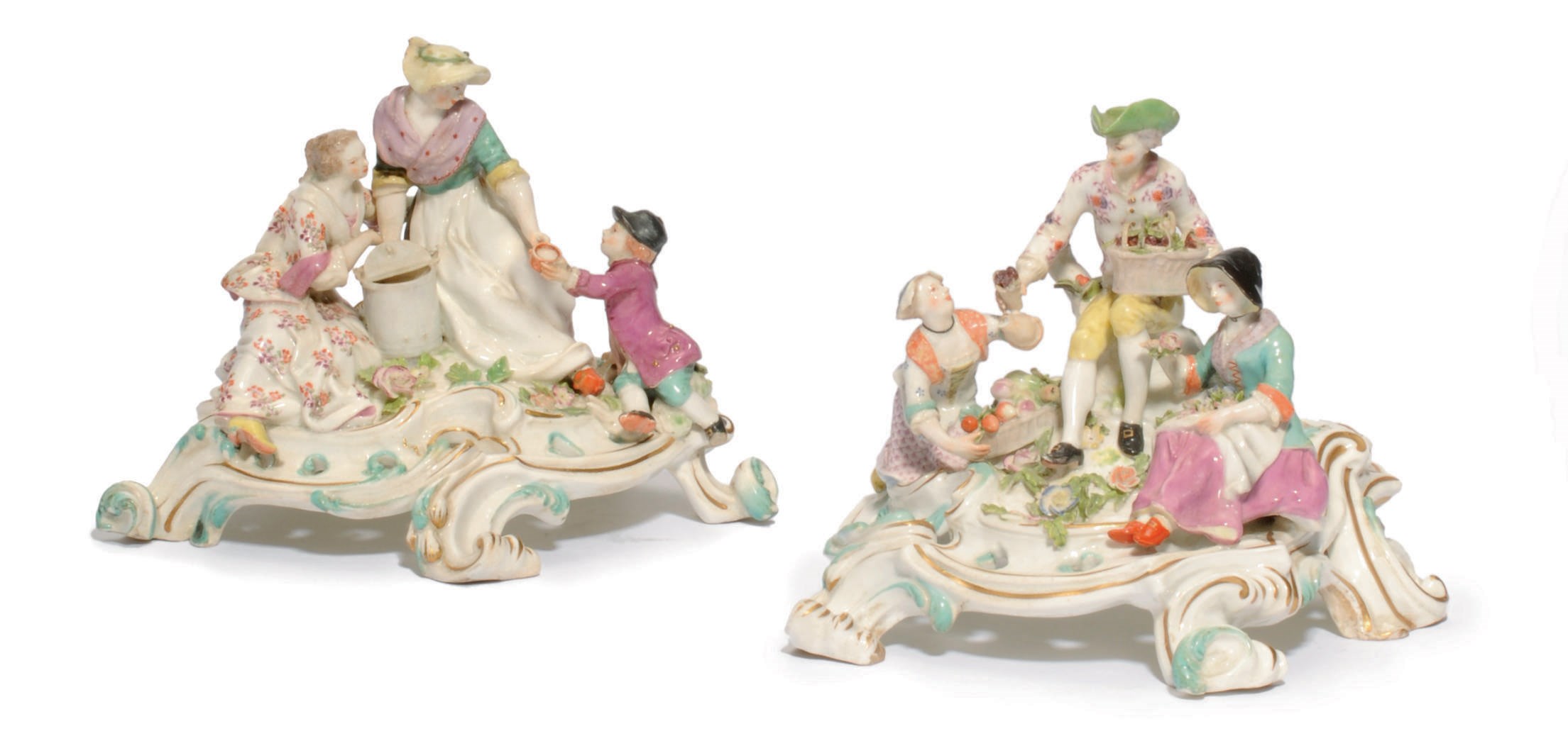 A PAIR OF CHELSEA RUSTIC GROUPS