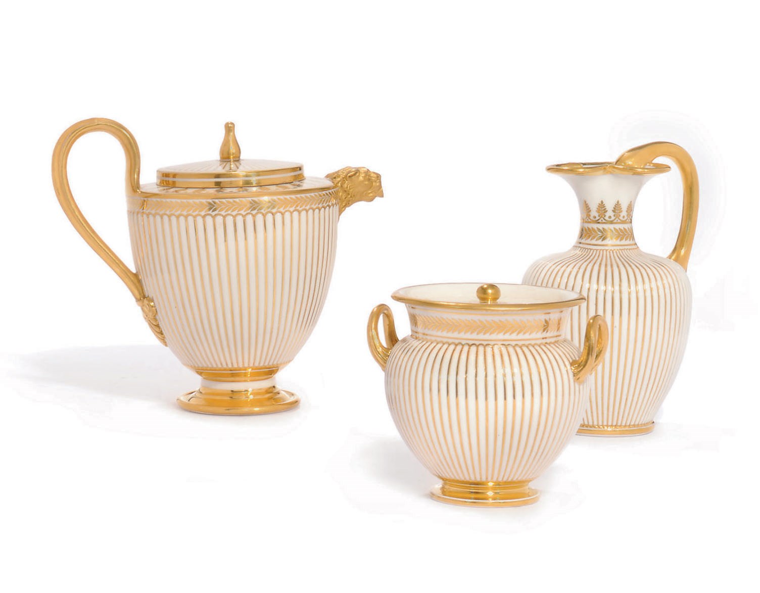 A SEVRES (HARD PASTE) GADROONED GILT AND WHITE PART TEA-SERVICE